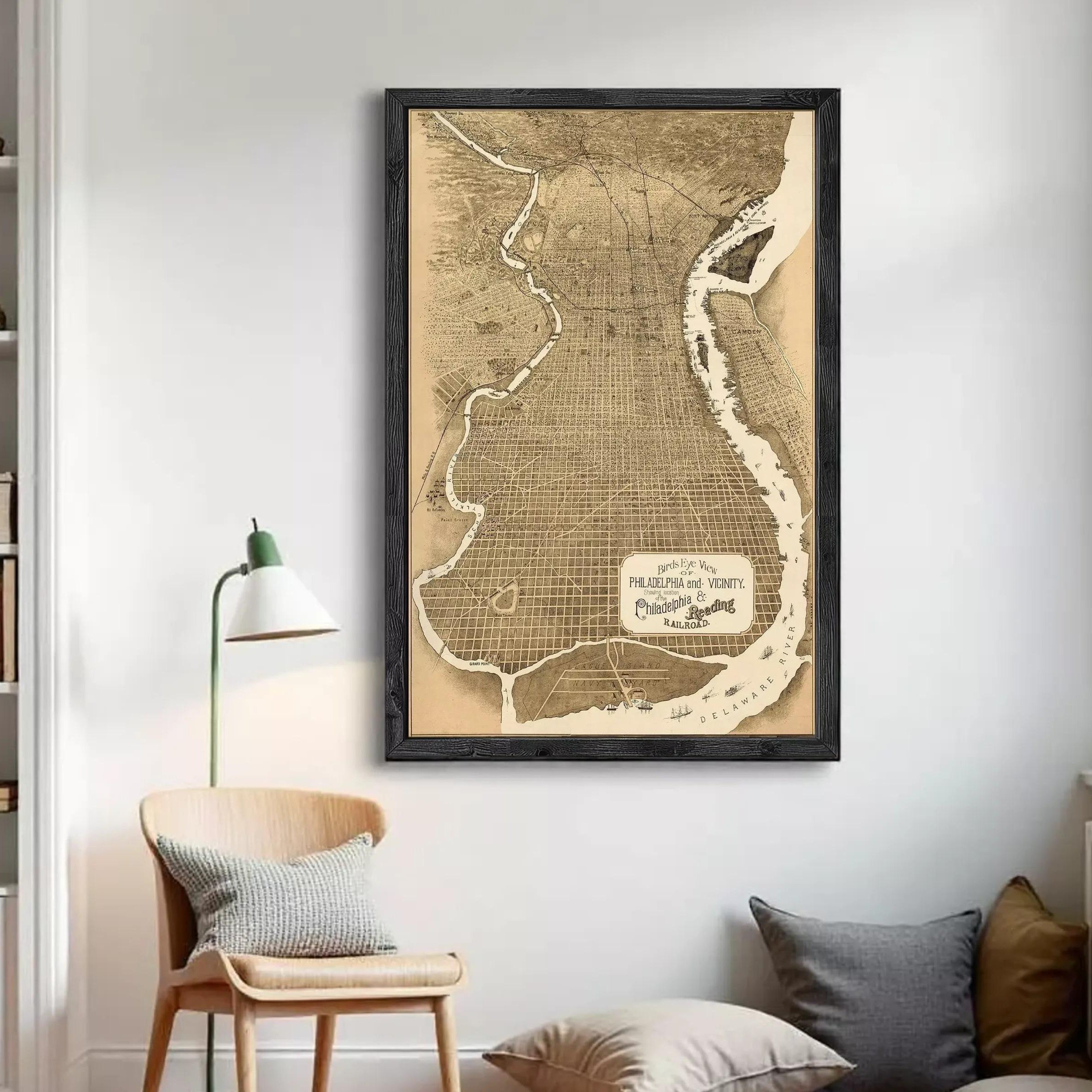 The image is a framed vintage map of Philadelphia, Pennsylvania, depicting the city's layout and surrounding areas.