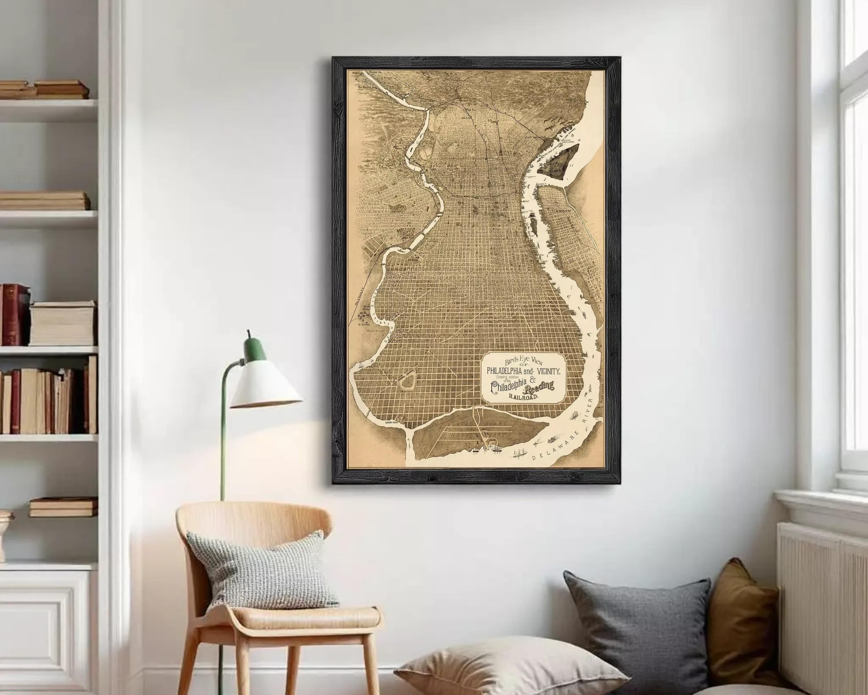 The image is a framed vintage map of Philadelphia, Pennsylvania, depicting the city's layout and surrounding areas.