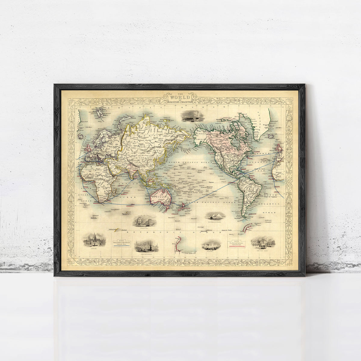 The image is a framed vintage world map depicting the continents and oceans in a detailed and intricate manner.