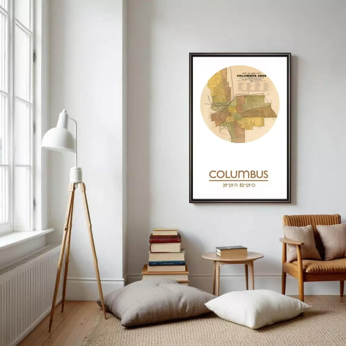 a cozy living room with a large framed map of Columbus, Ohio, hanging on the wall. The room has a wooden floor, a lamp, a chair, and a stack of books.