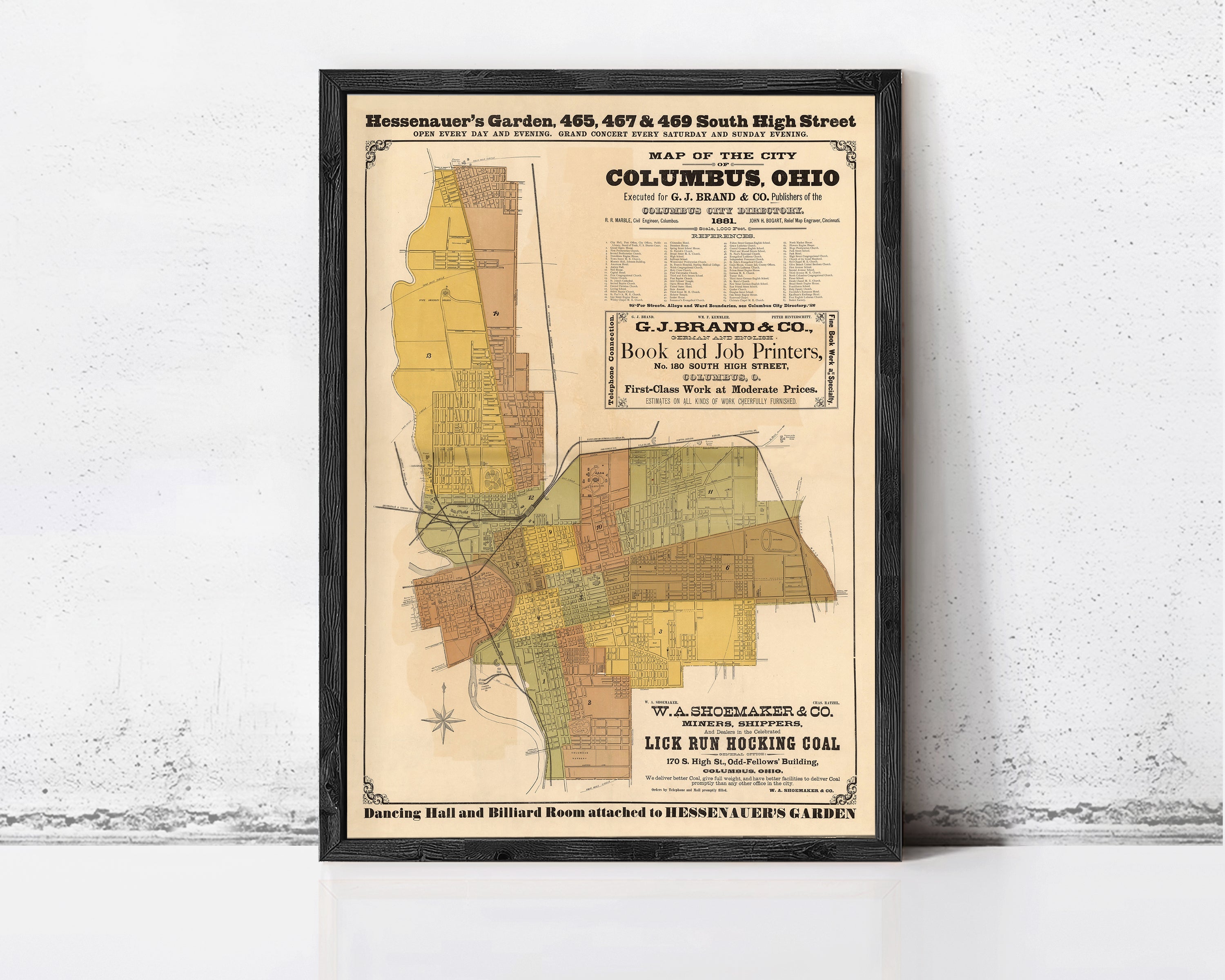 The image is a framed vintage map of the city of Columbus, Ohio, depicting the layout of the city and surrounding areas.