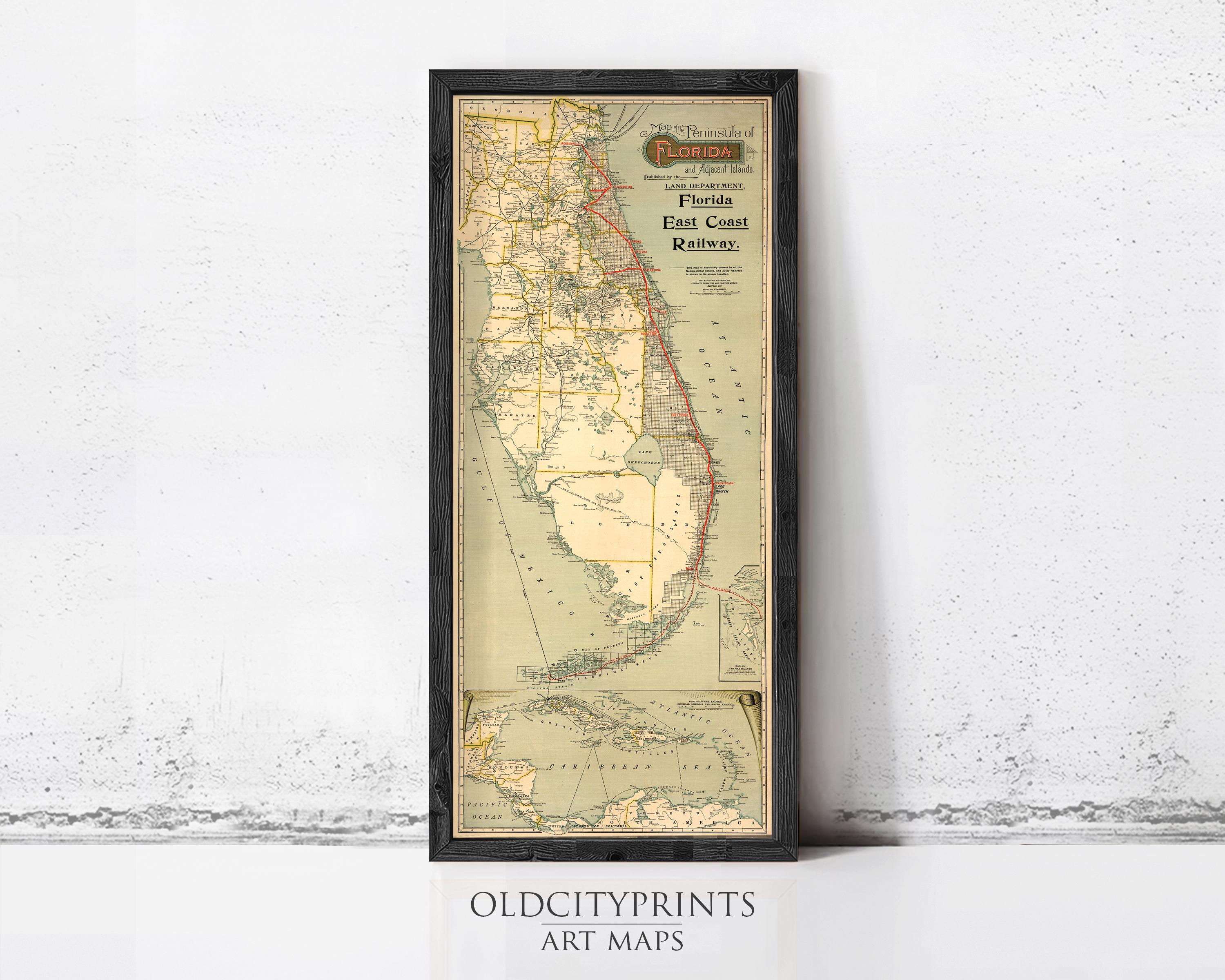 The image is a framed vintage map of Florida, showing the state's land, coastline, and surrounding areas.