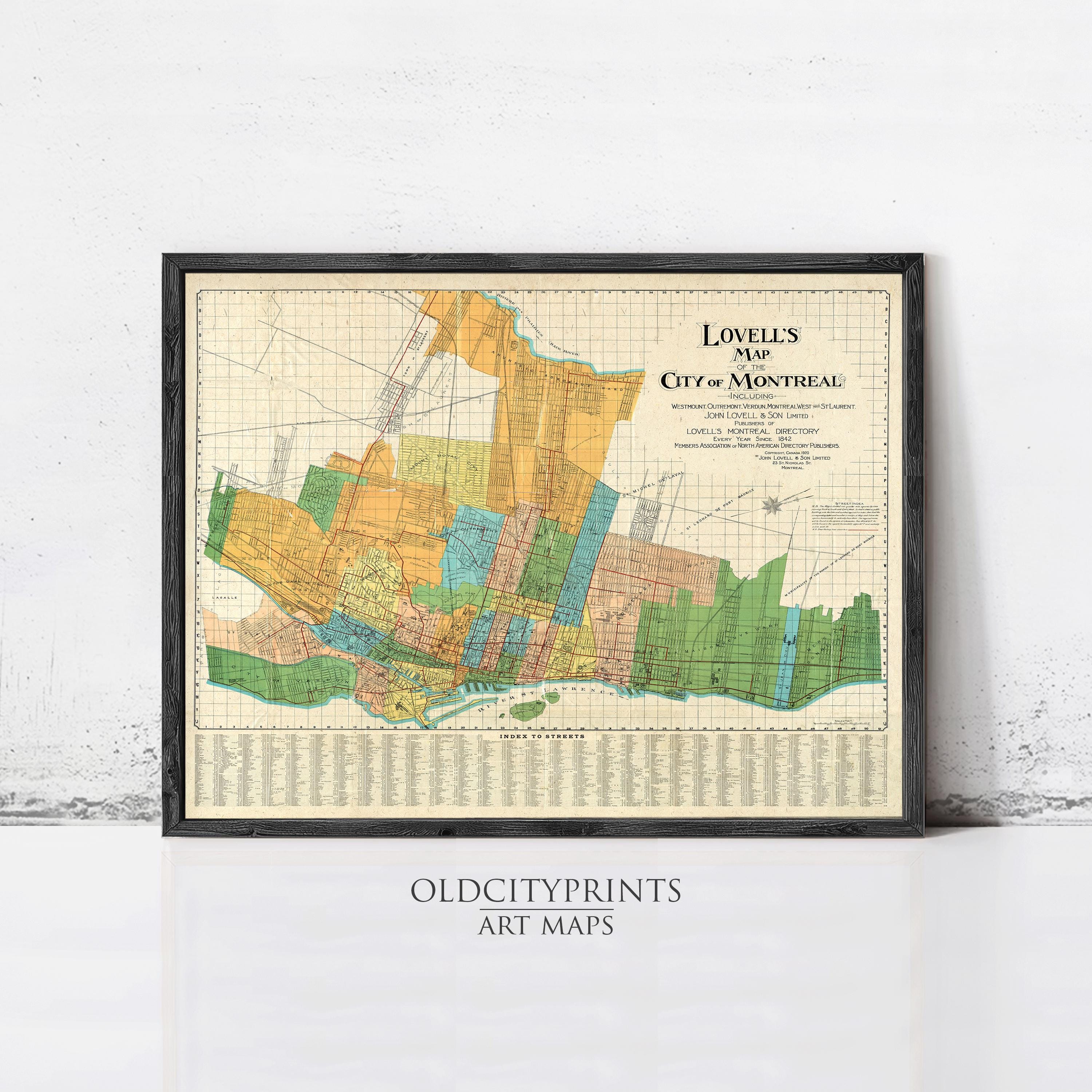 A framed vintage map of Loveland, Minnesota, with various colored sections representing different neighborhoods and areas within the city.