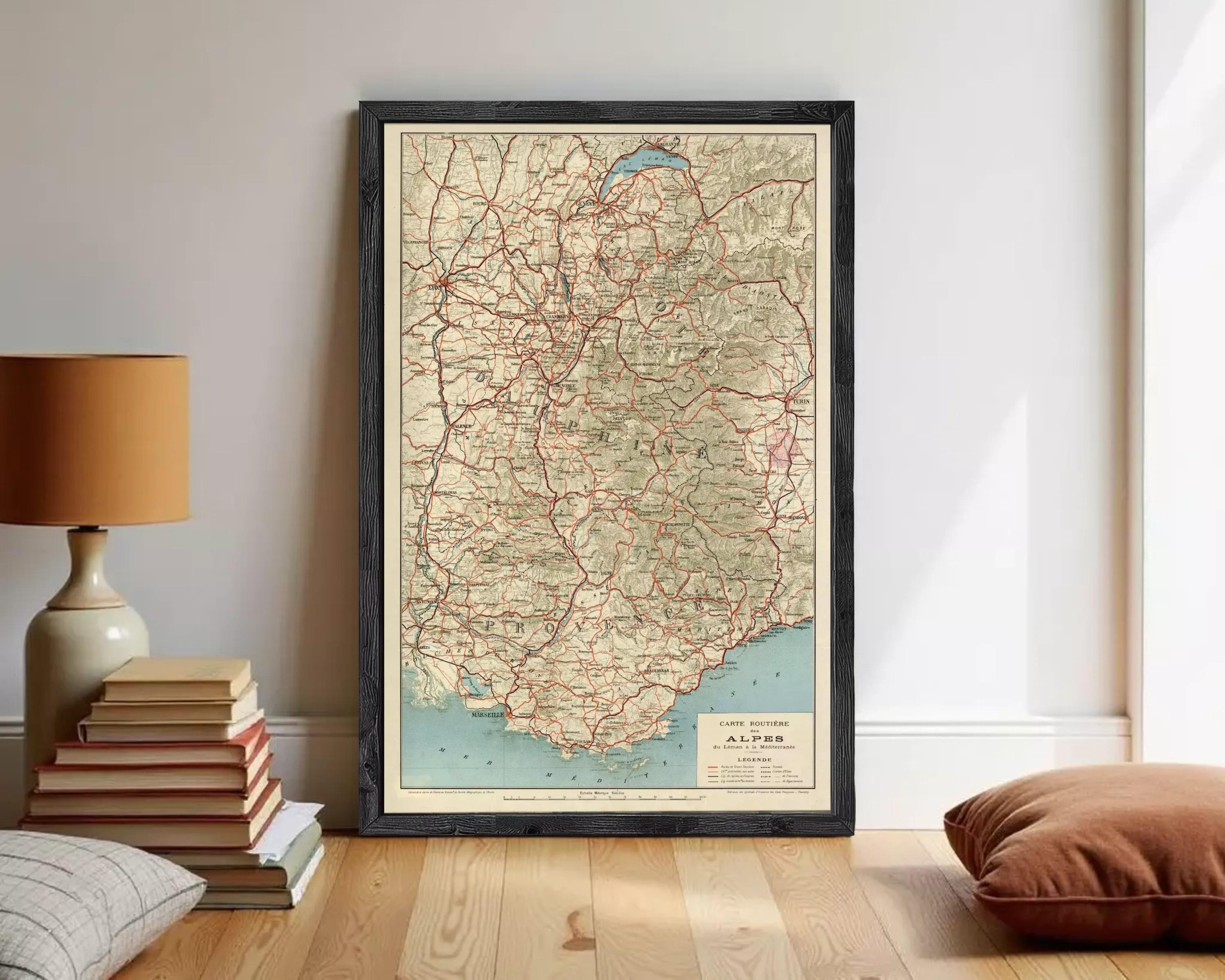 The image is a framed vintage map of the Alpes region, depicting the various mountain ranges and roads in the area.