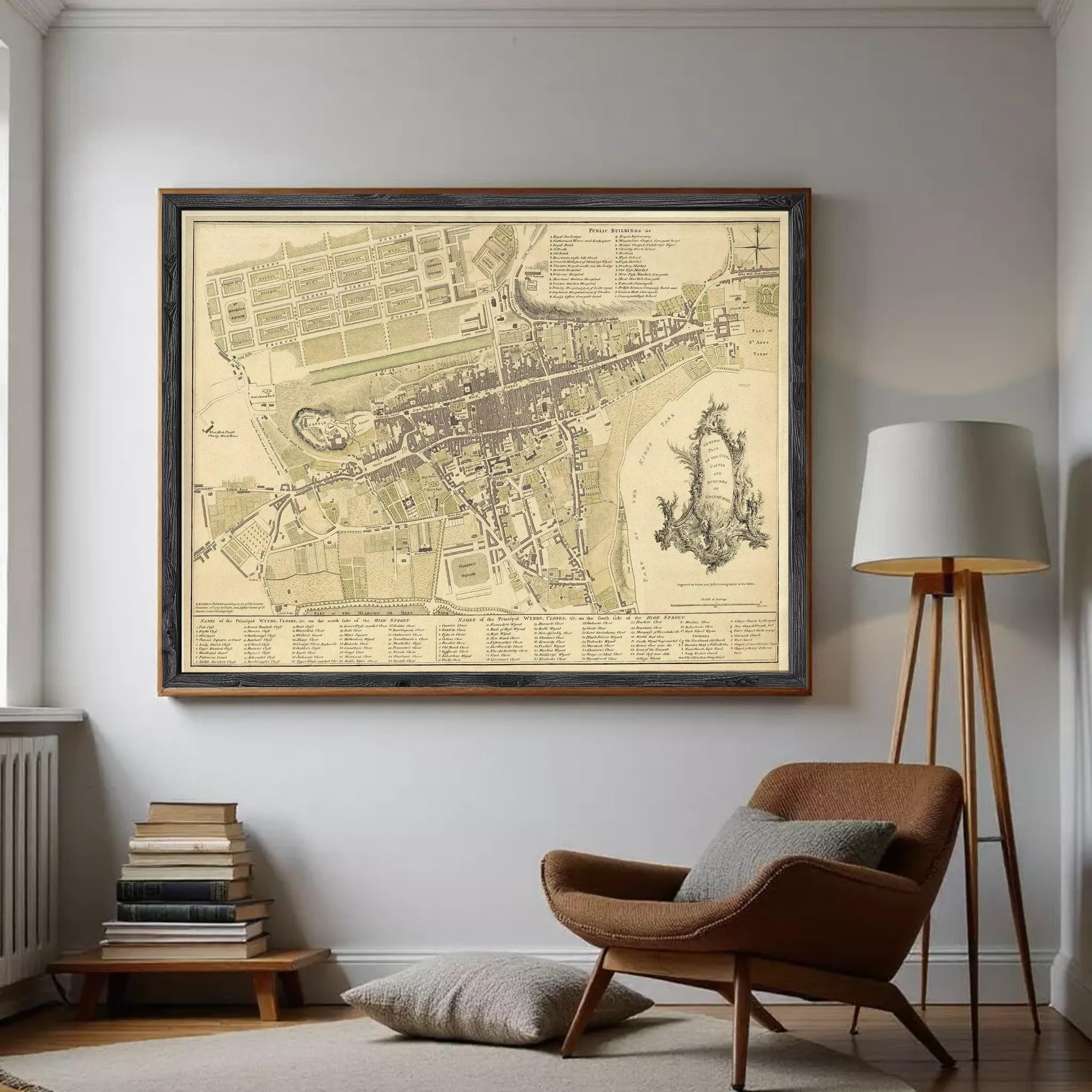 The image is a framed vintage map of a city, depicting a detailed layout of streets, buildings, and other urban features.