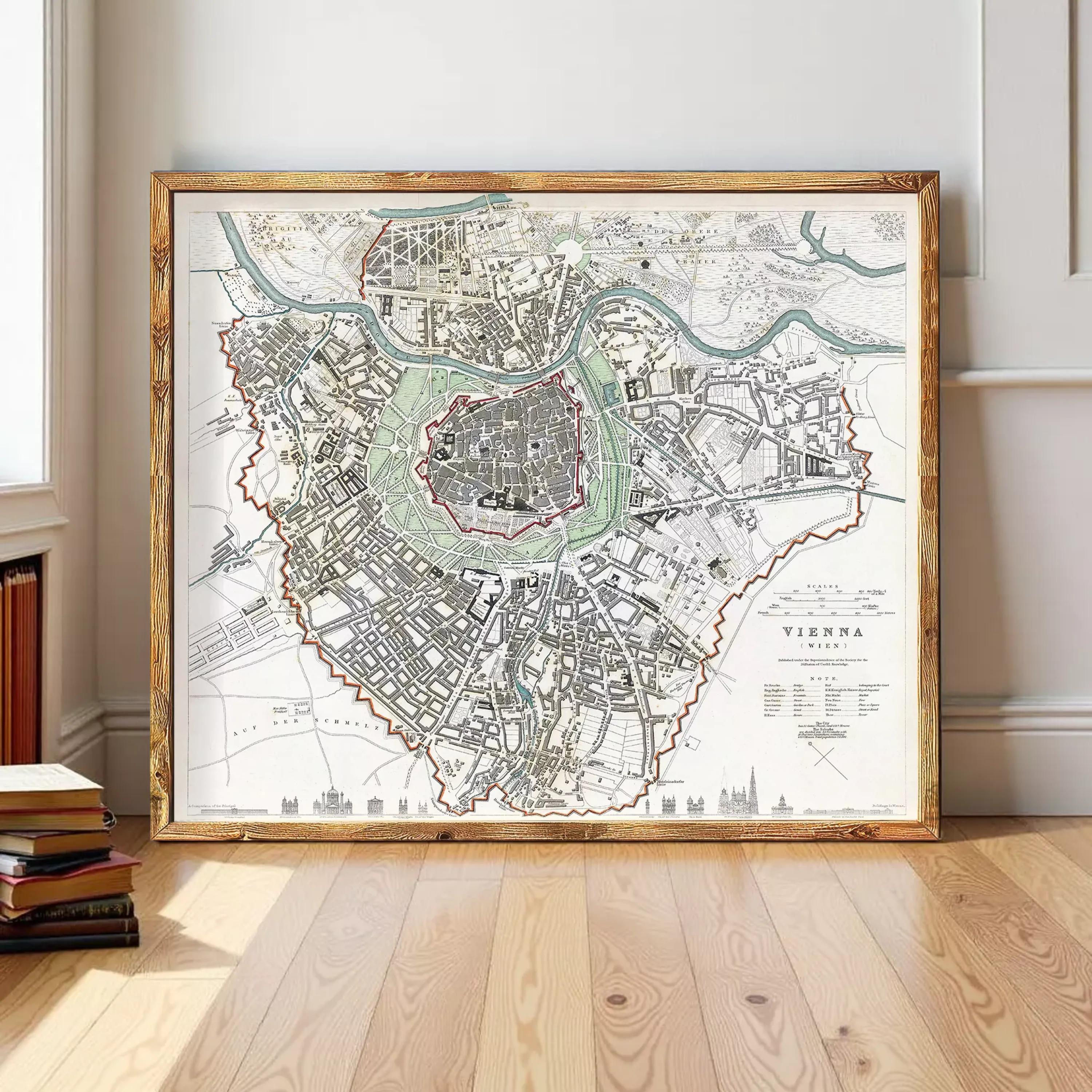 The image is a large framed map of the city of Vienna, Austria, depicting the city's streets, landmarks, and surrounding areas.