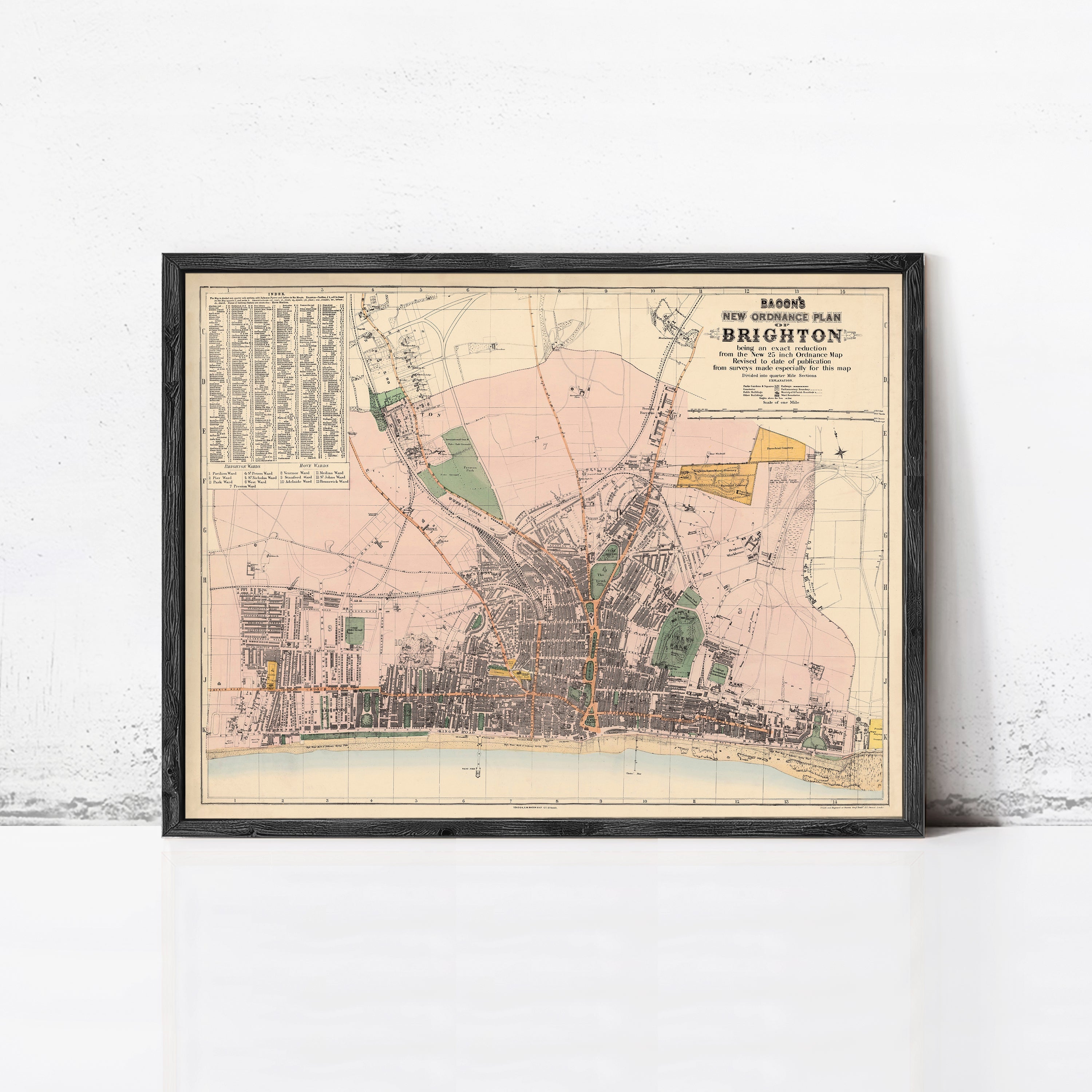 The image is a framed vintage map of Brighton, showing the city's layout and surrounding areas.