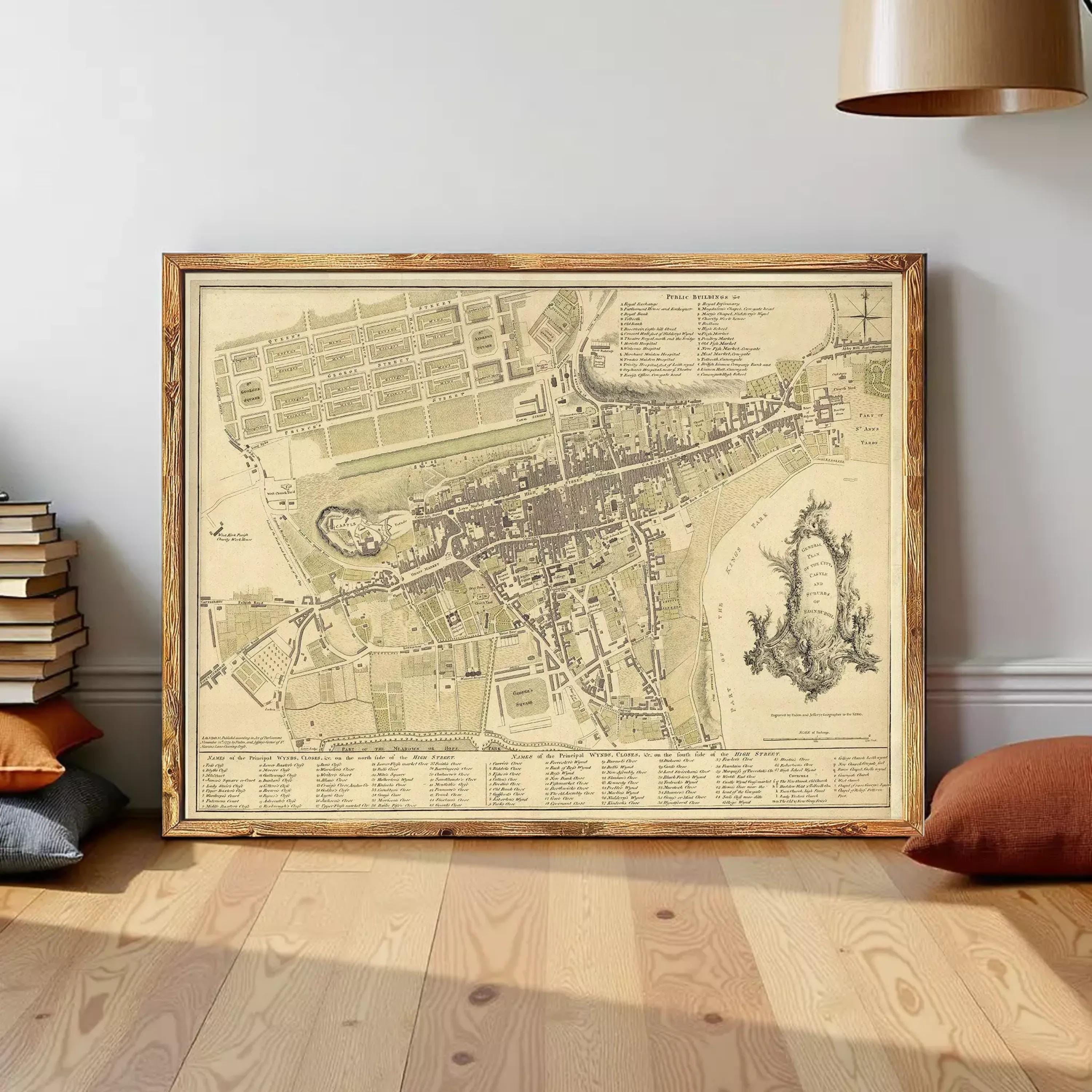 The image is a framed historical map of a city, likely from the 18th century, depicting a detailed layout of the streets, buildings, and surrounding areas.