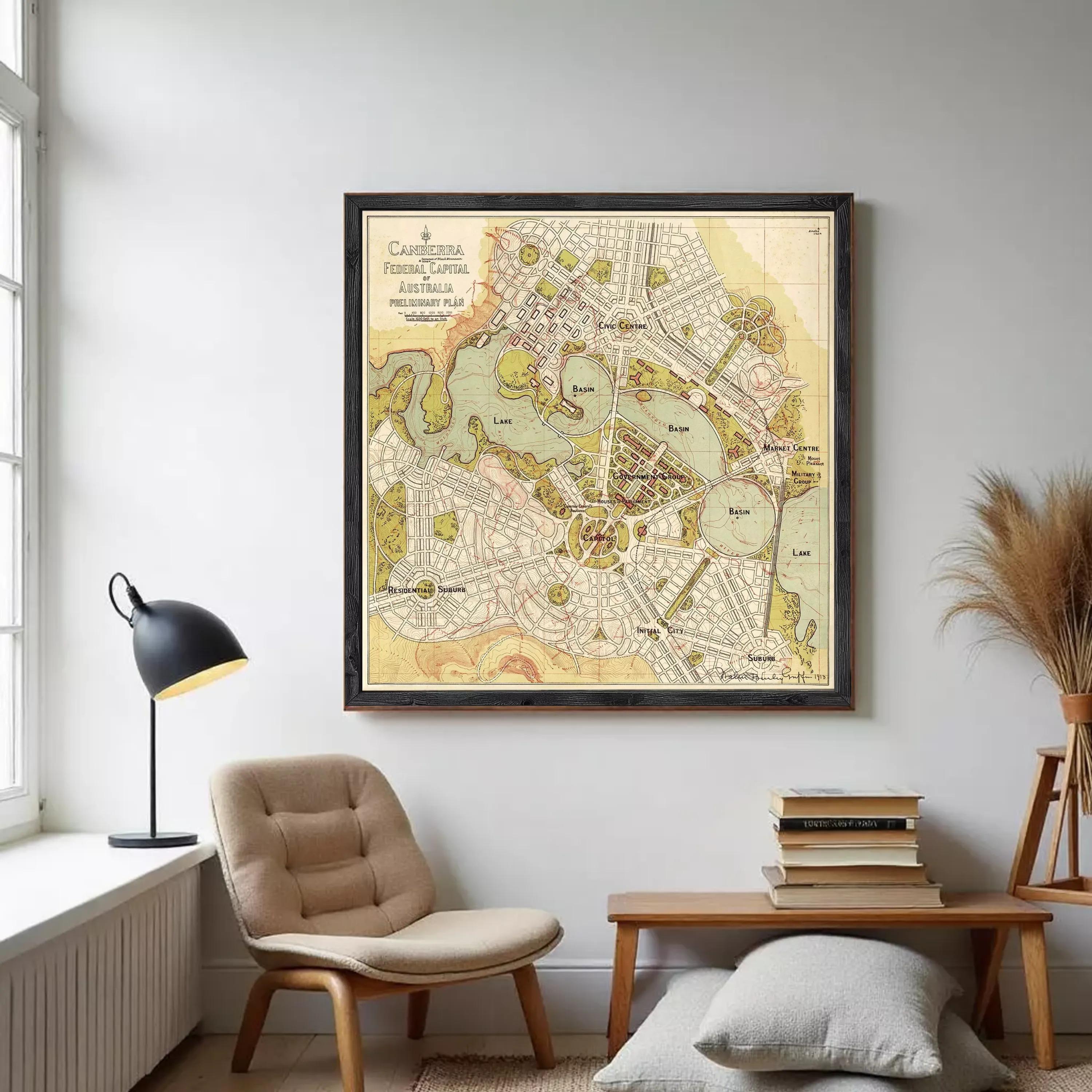 The image is a framed vintage map of a city, depicting various landmarks and streets.