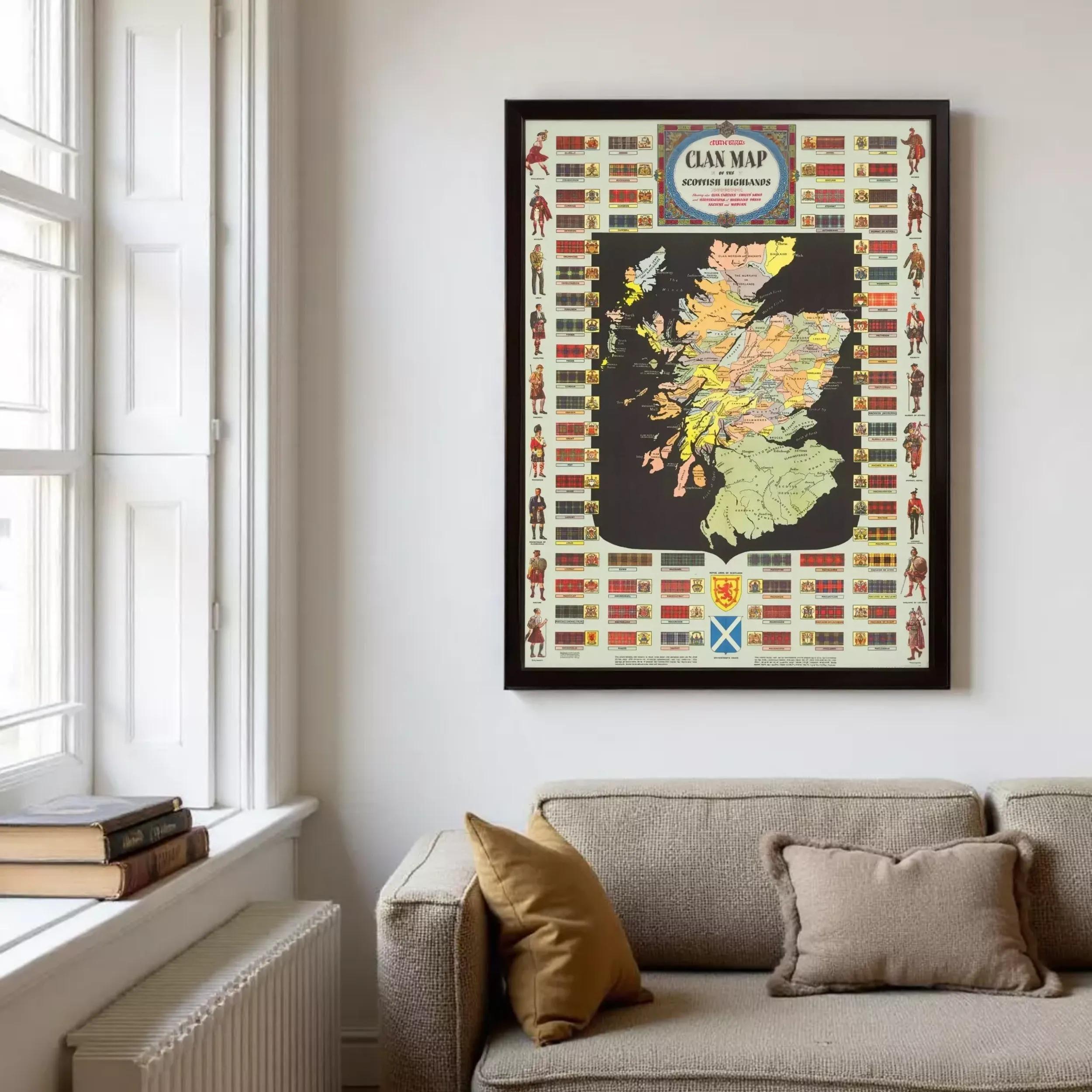 a framed map of Scotland hanging on a wall, with a cozy living room setting with a couch and a radiator below it.