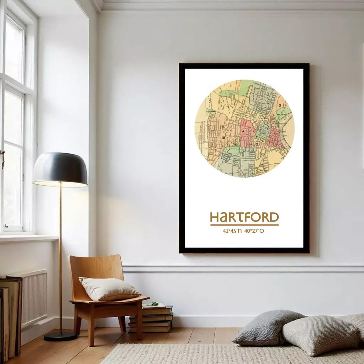 A framed vintage map of the city of Hartford, Connecticut, with the city's name and location printed below the map.