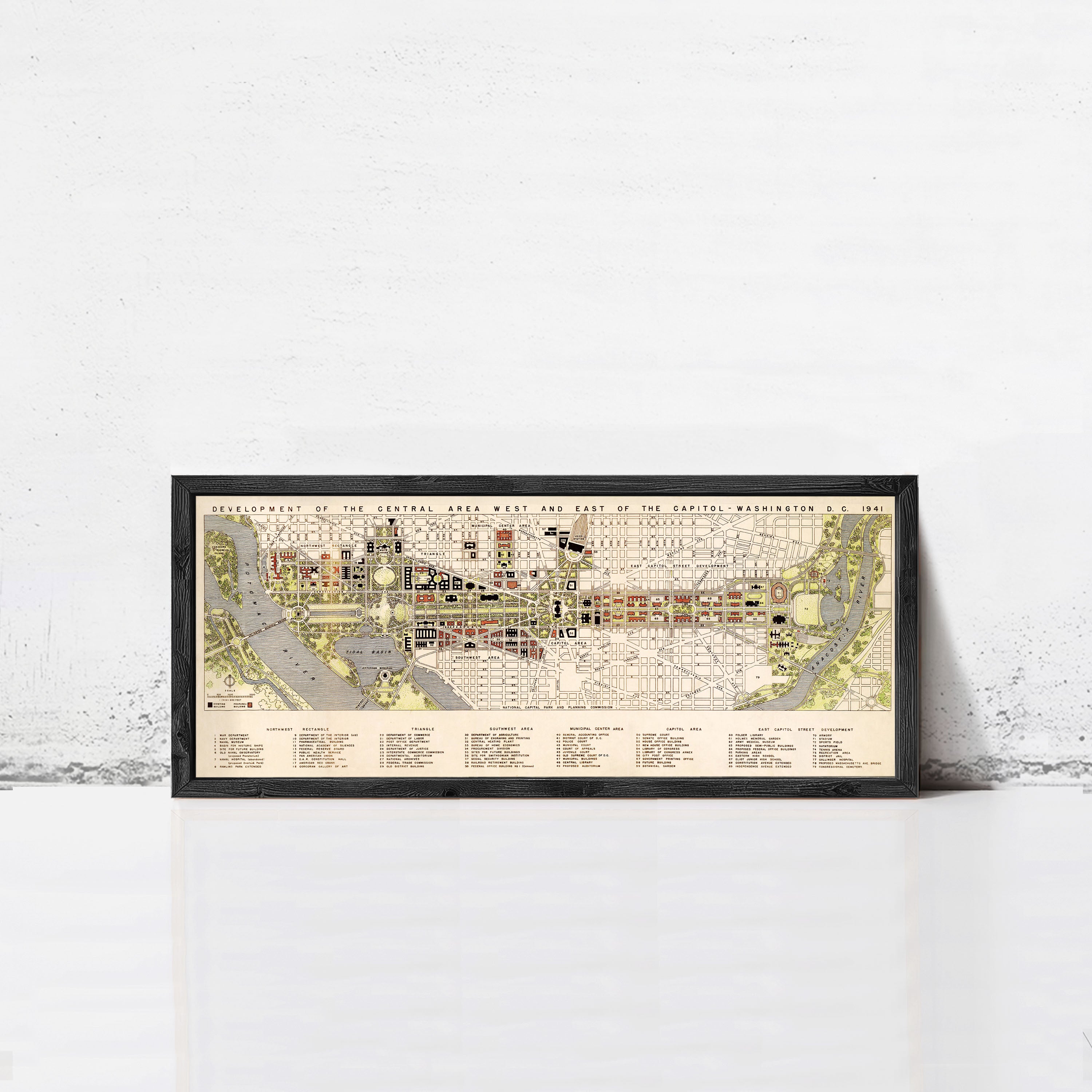 A framed map of Washington, D.C. from 1941, depicting the city's central area and part of the Capitol building.