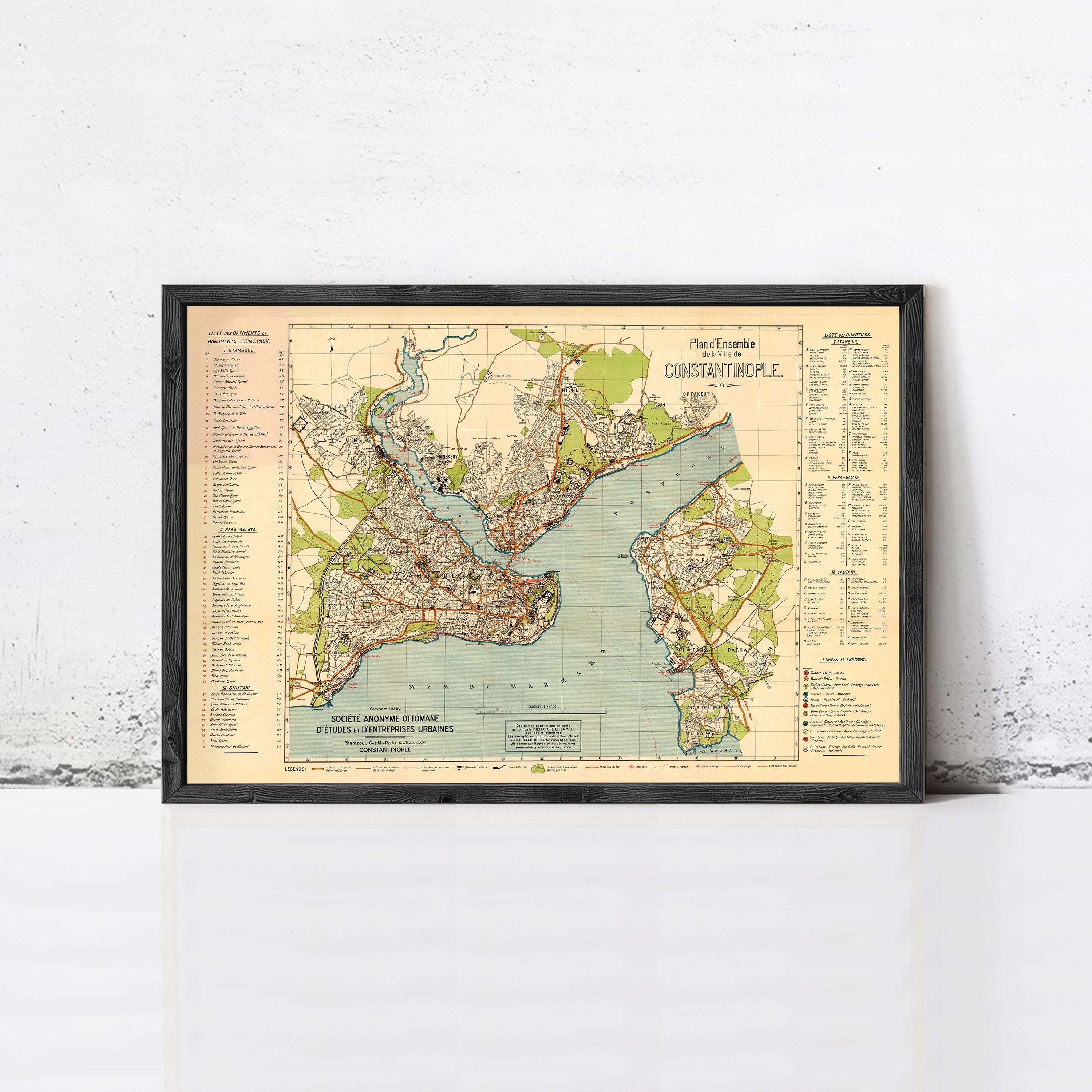 The image is a framed vintage map of a city, likely New York, with various streets, landmarks, and bodies of water labeled.