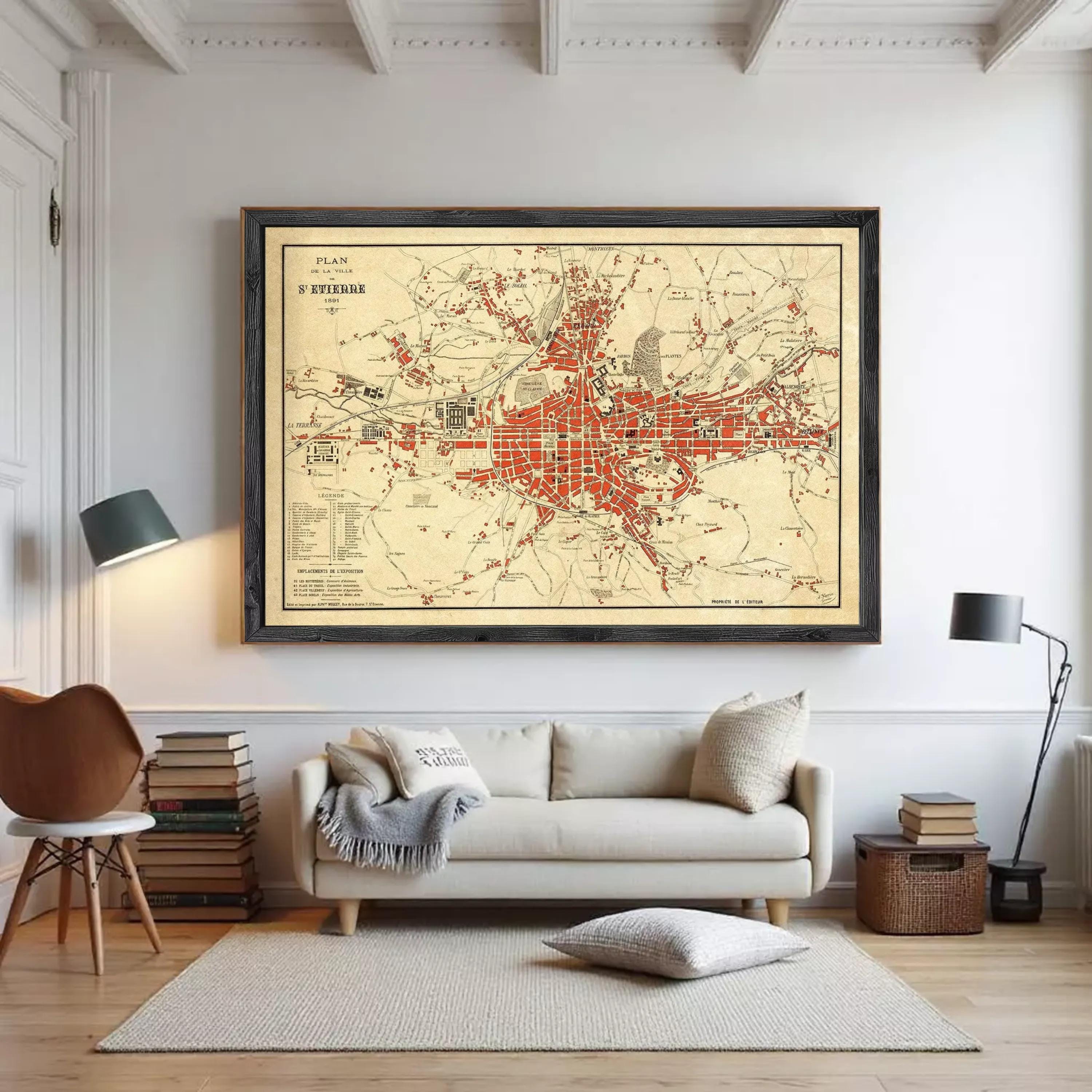 The image is a framed vintage map of a city, likely from the 19th century, depicting the layout and streets of the city.