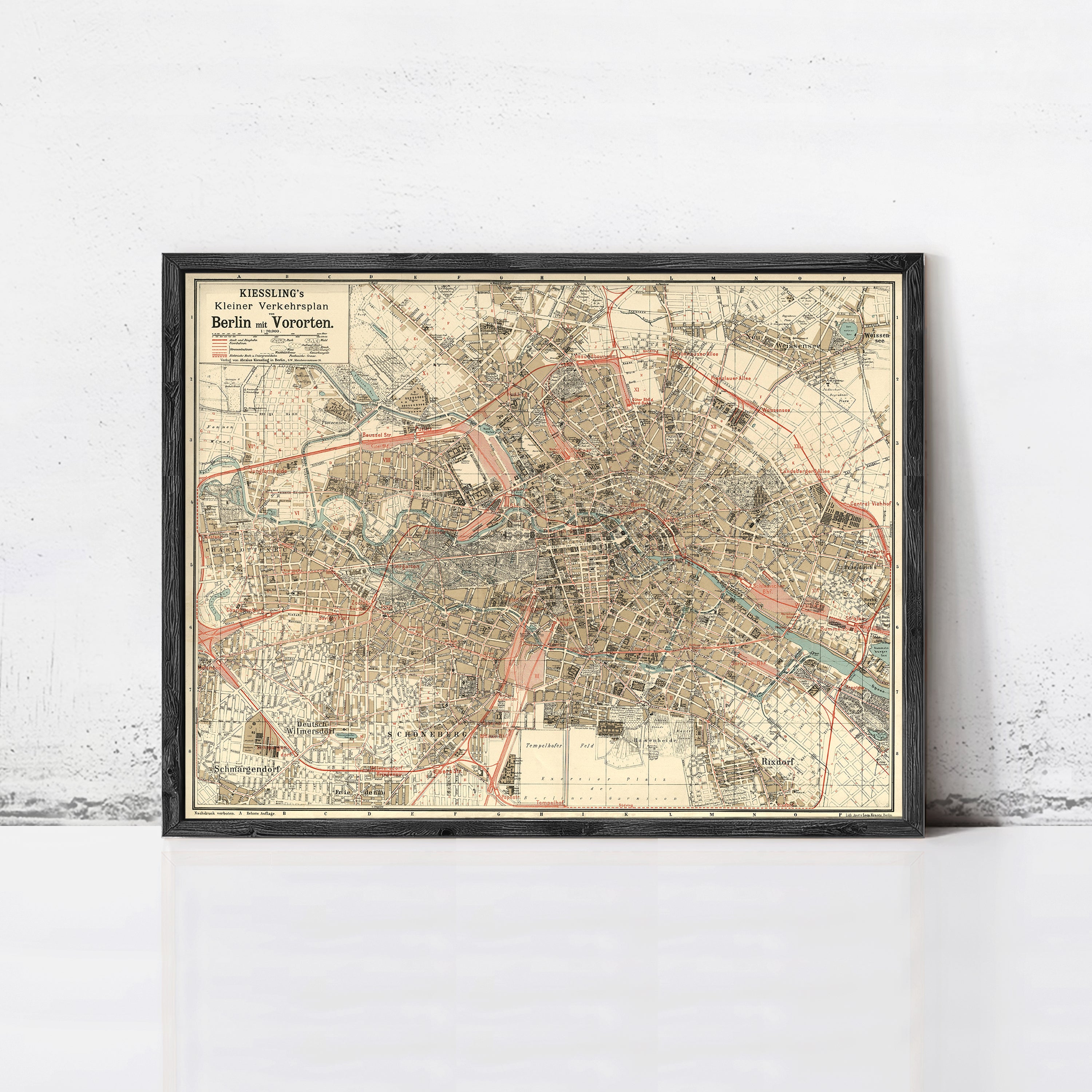 The image is a framed vintage map of Berlin, Germany, depicting the city's streets and surrounding areas.