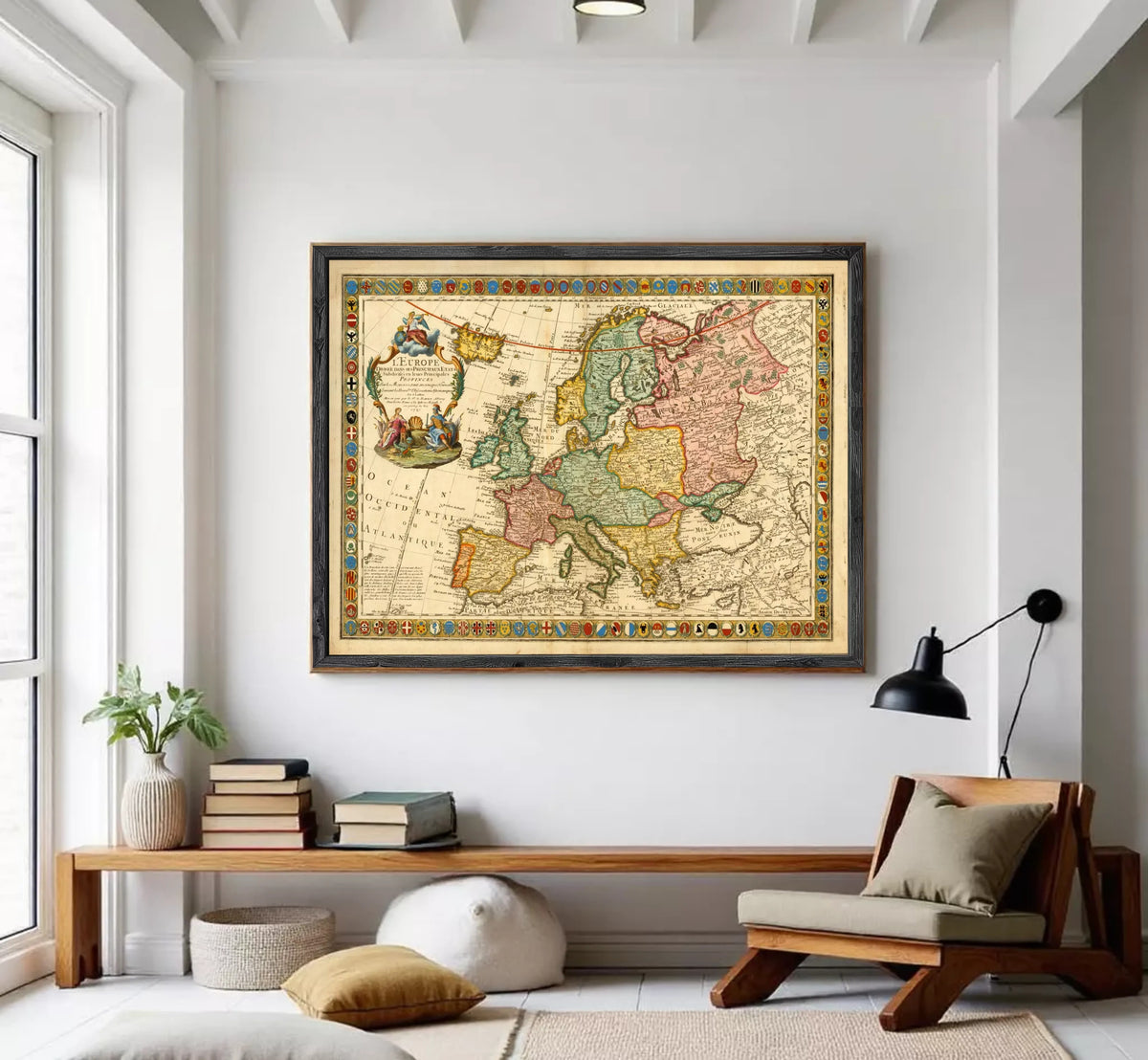 The image is a framed antique map of Europe, featuring detailed cartography and colorful borders.