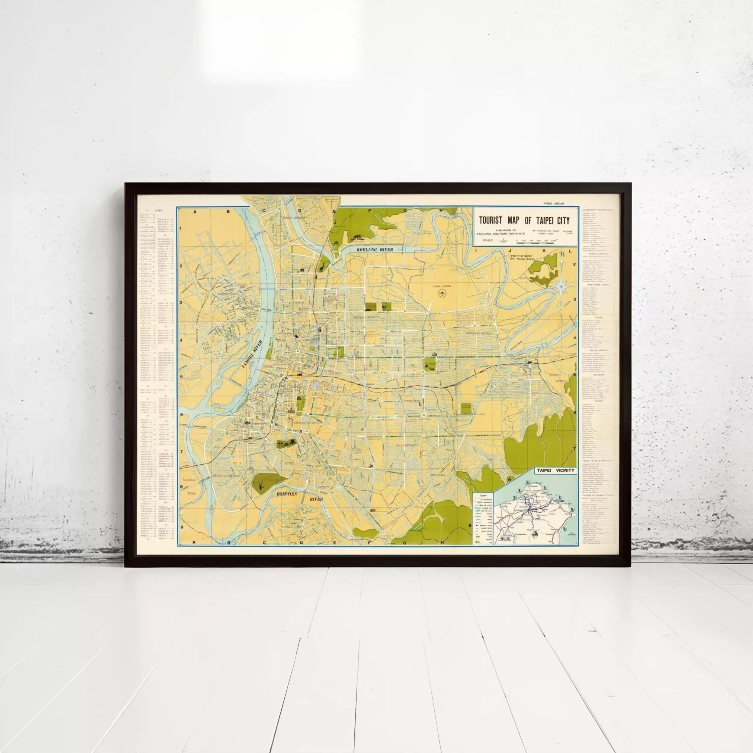 The image is a framed vintage map of Taipei City, Taiwan, depicting the city's streets, landmarks, and surrounding areas.