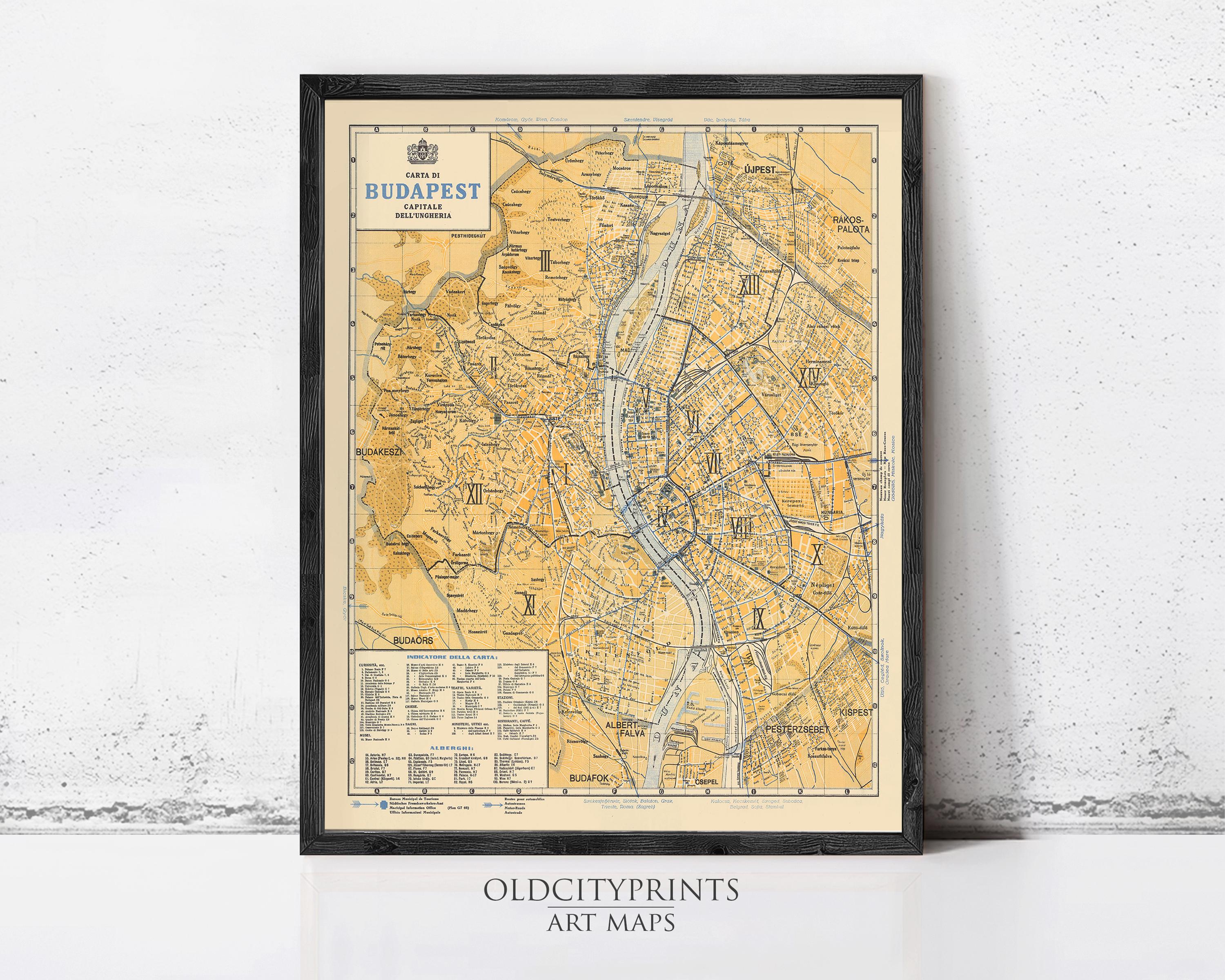 The image is a framed vintage map of Budapest, Hungary, depicting the city's streets, landmarks, and surrounding areas.