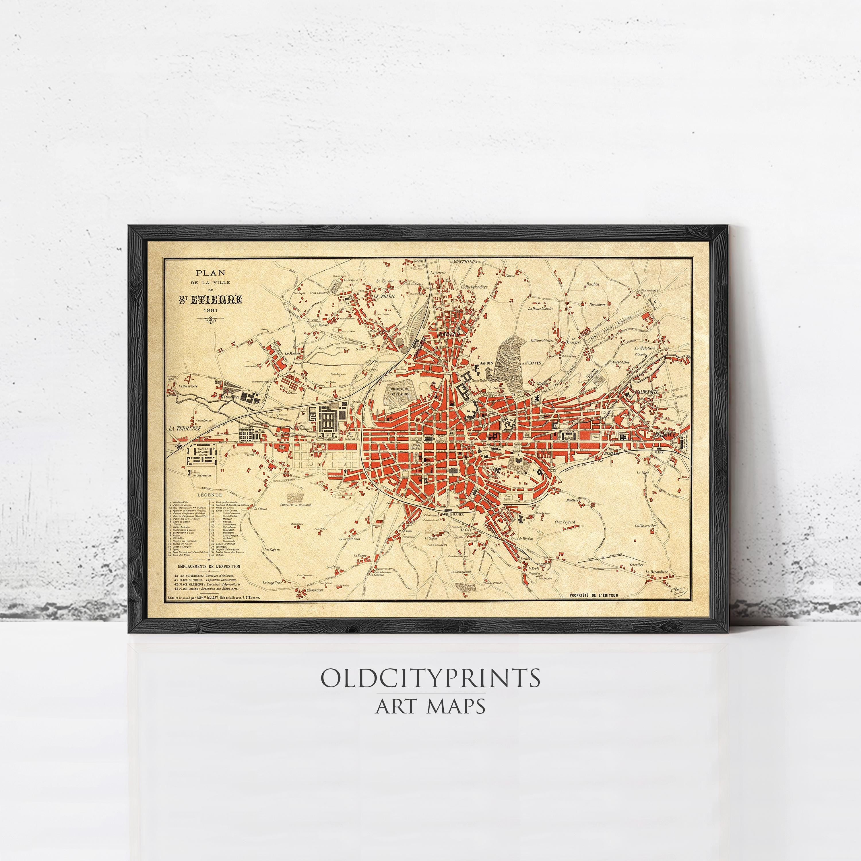 The image is a framed vintage map of a city, likely from the 19th century, with a red and beige color scheme.