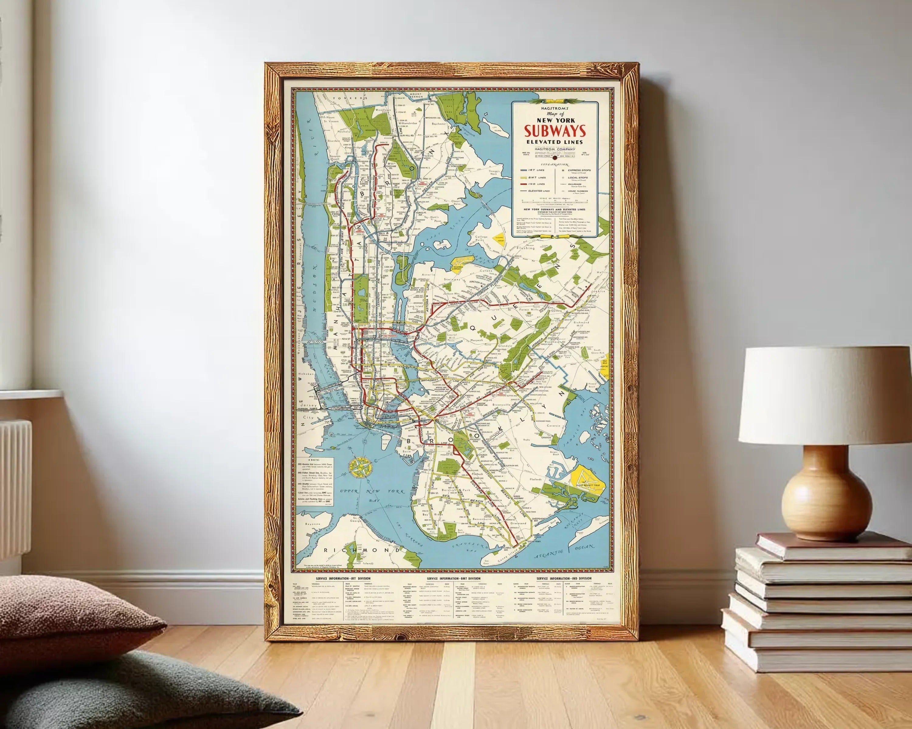The image is a framed subway map of New York City, displaying the extensive subway network and various stations.