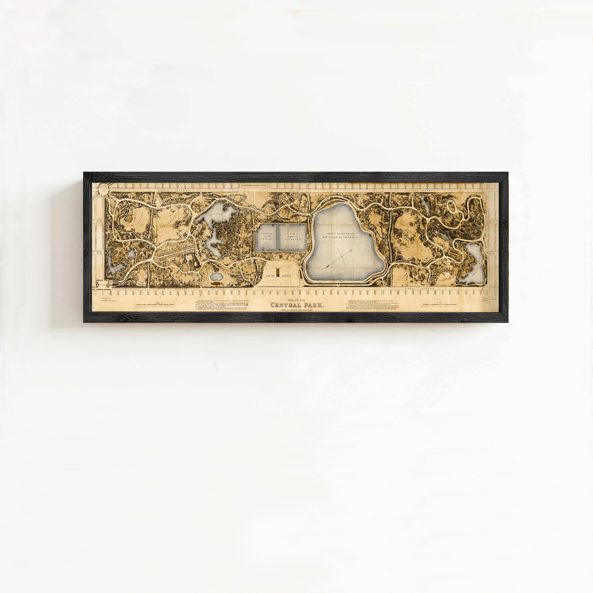 The image is a framed map of Central Park, New York City, depicting the park's layout and surrounding areas.