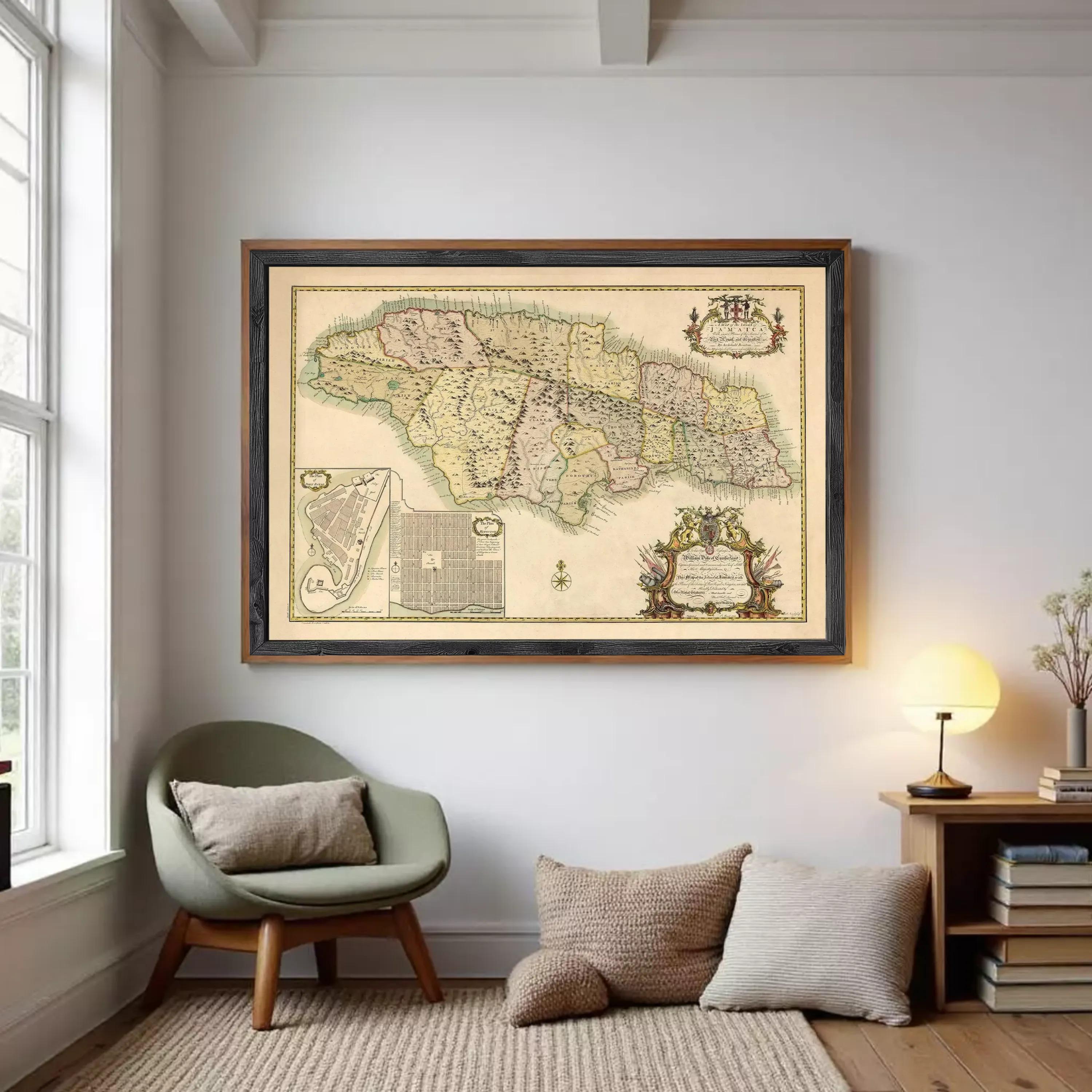 The image is a framed vintage map of Jamaica, featuring detailed geographical information and a decorative border.