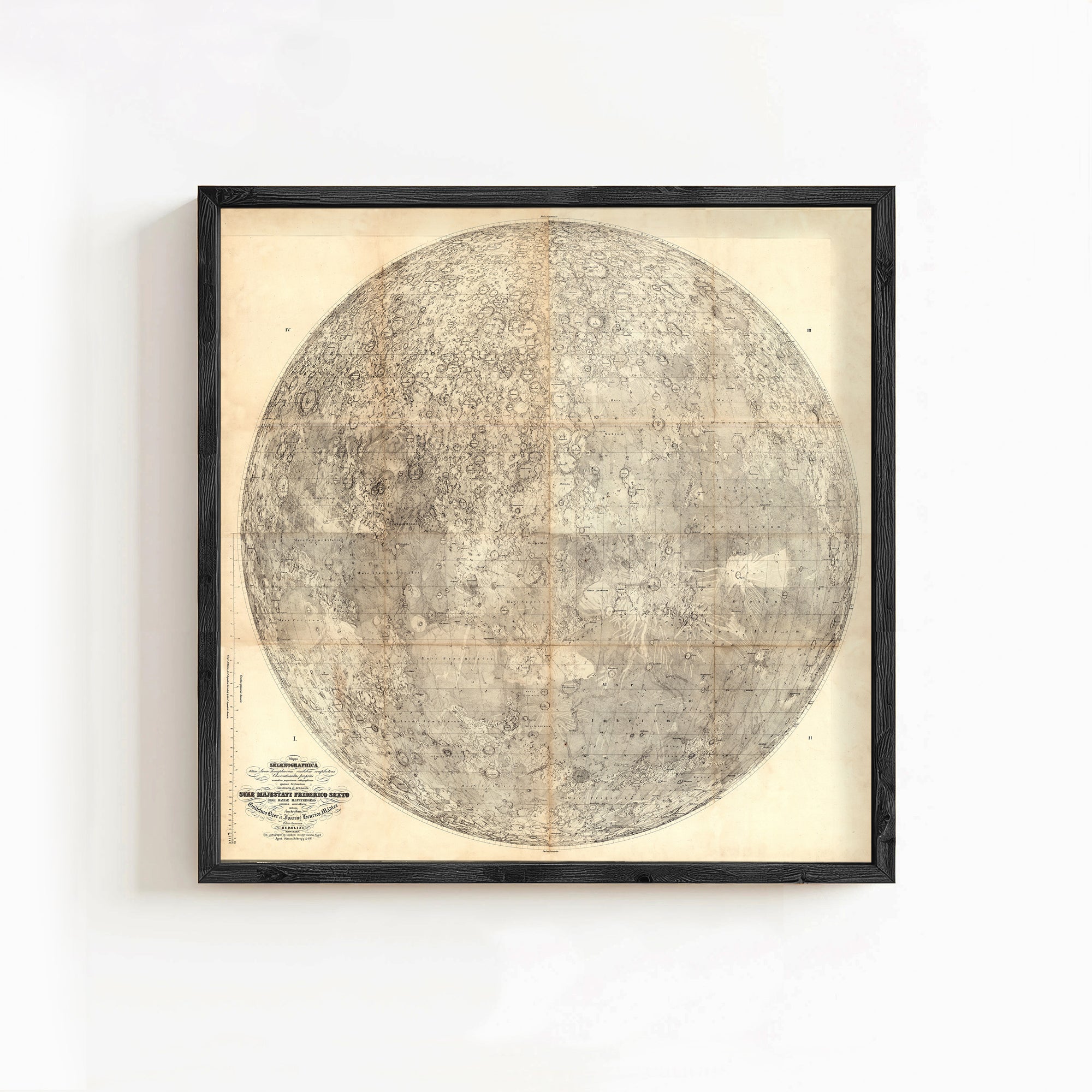 The image is a framed vintage map of the moon, depicting the moon's surface in detail.