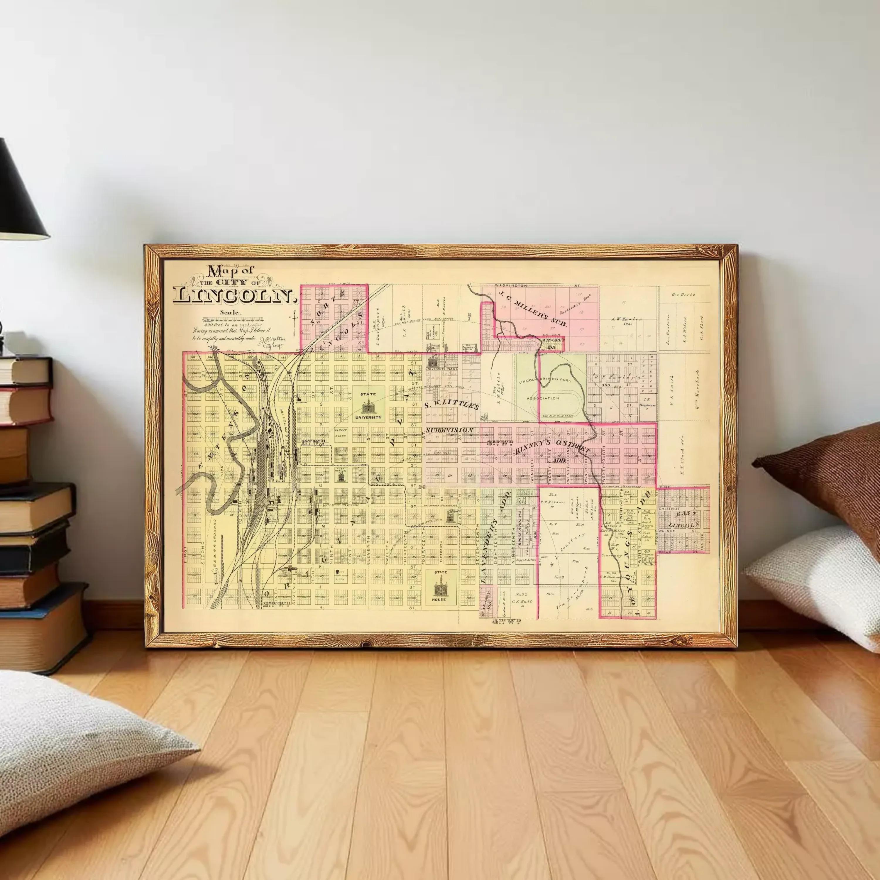 A framed map of the city of Lincoln, Illinois, with various landmarks and streets labeled.