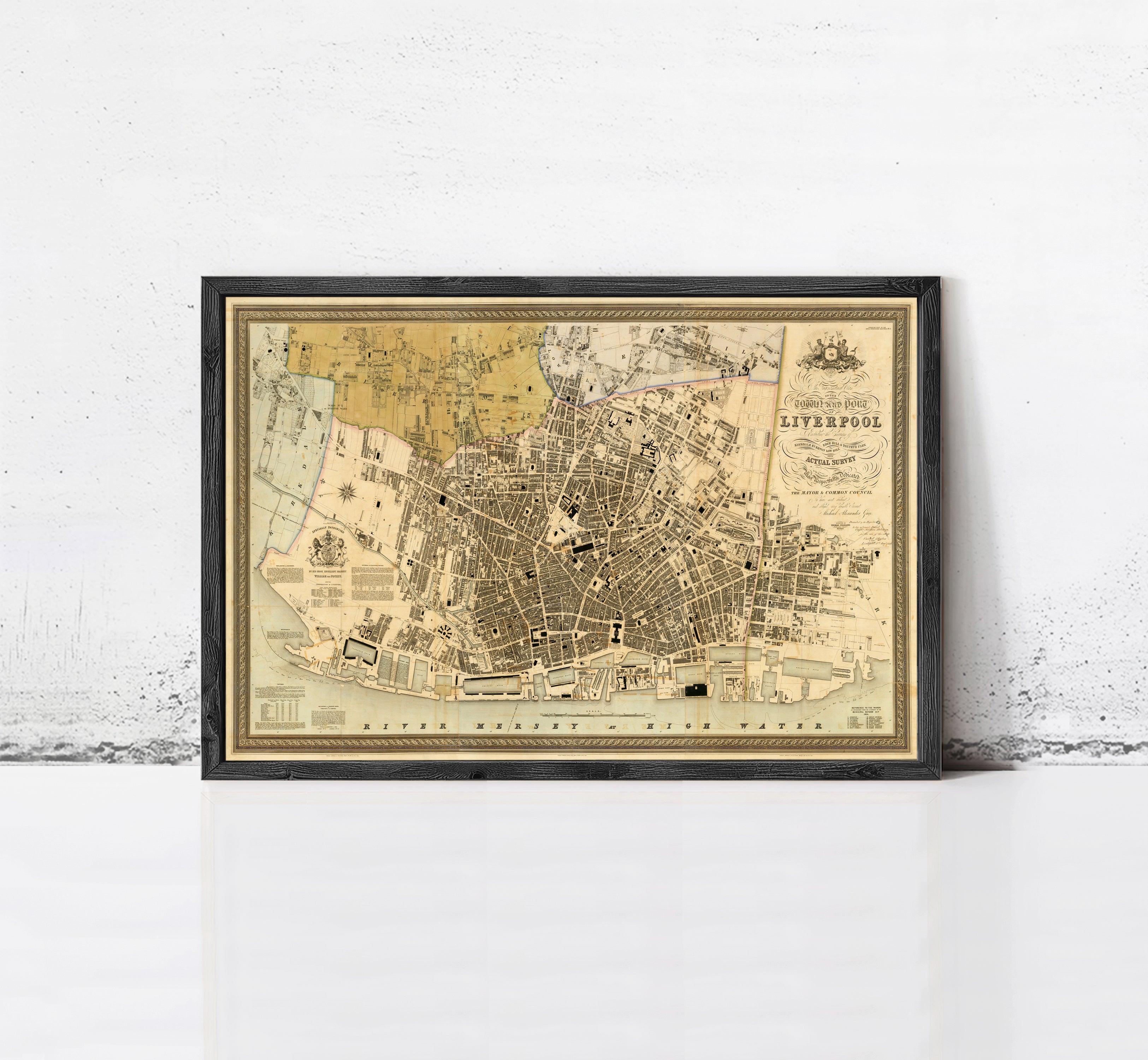 The image is a framed vintage map of Liverpool, England, depicting the city's layout and surrounding areas.