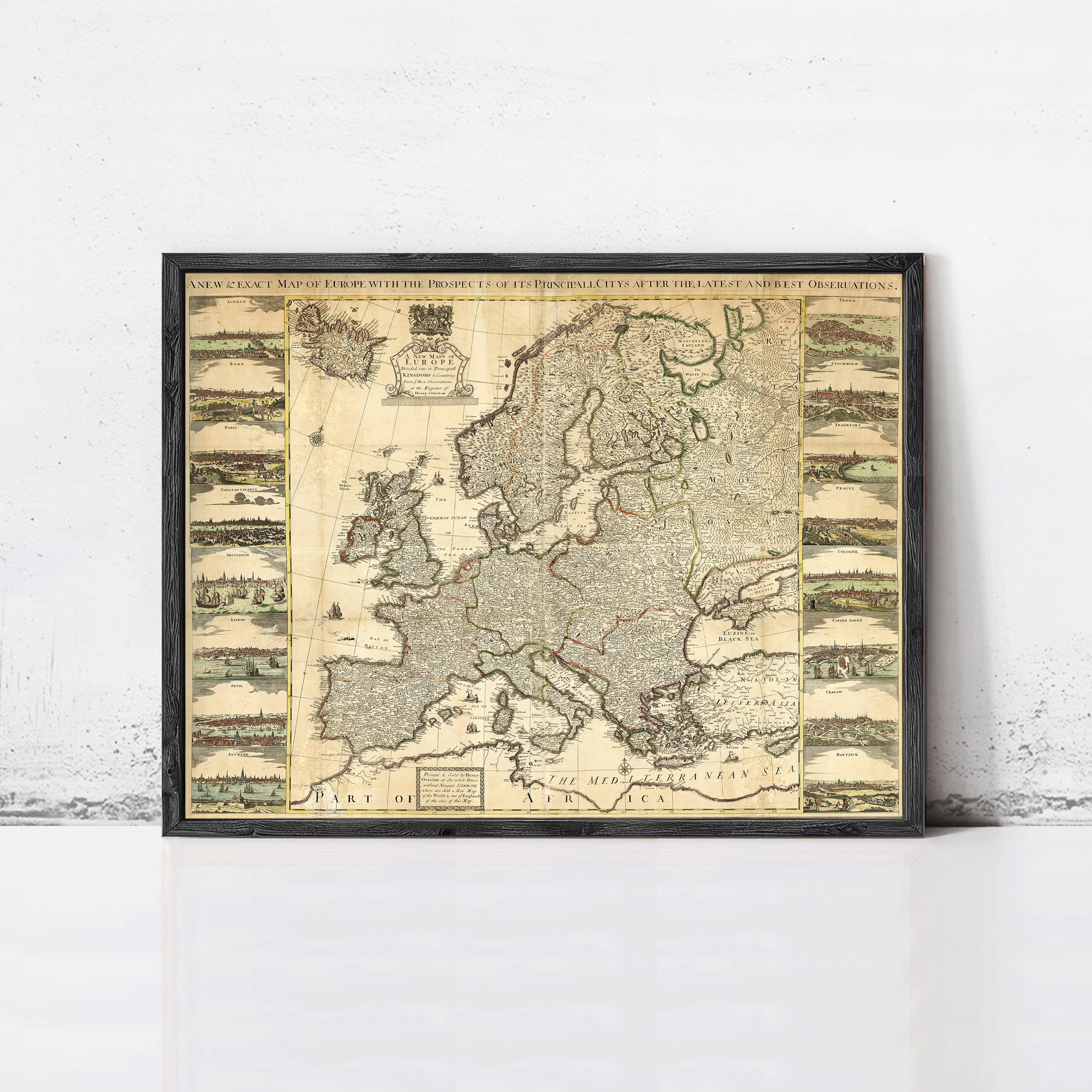 The image is a framed antique map of Europe, depicting various regions and countries across the continent.