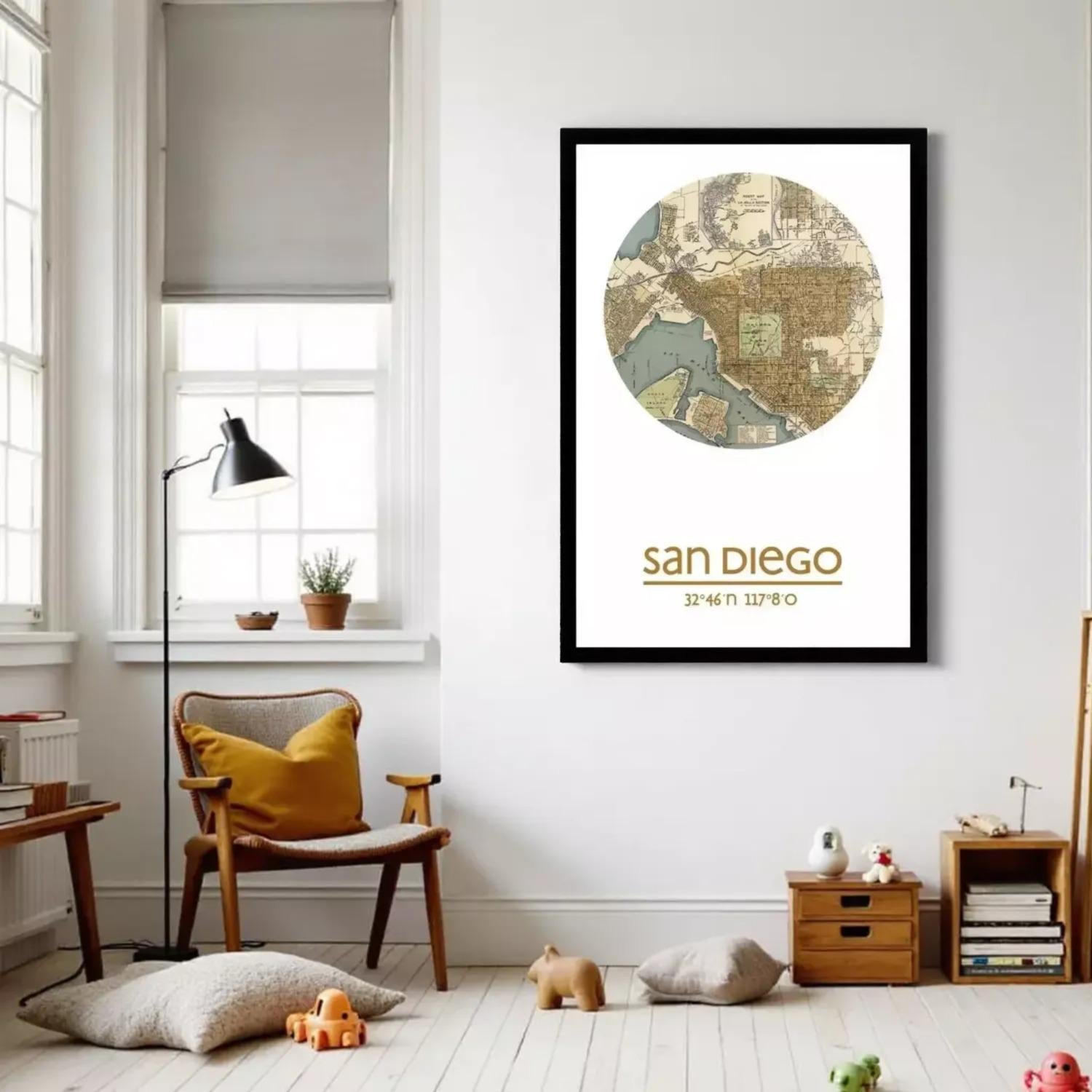 a cozy living room with a large framed map of San Diego hanging on the wall. The room has a comfortable chair, a lamp, and various decorative items, creating a warm and inviting atmosphere.