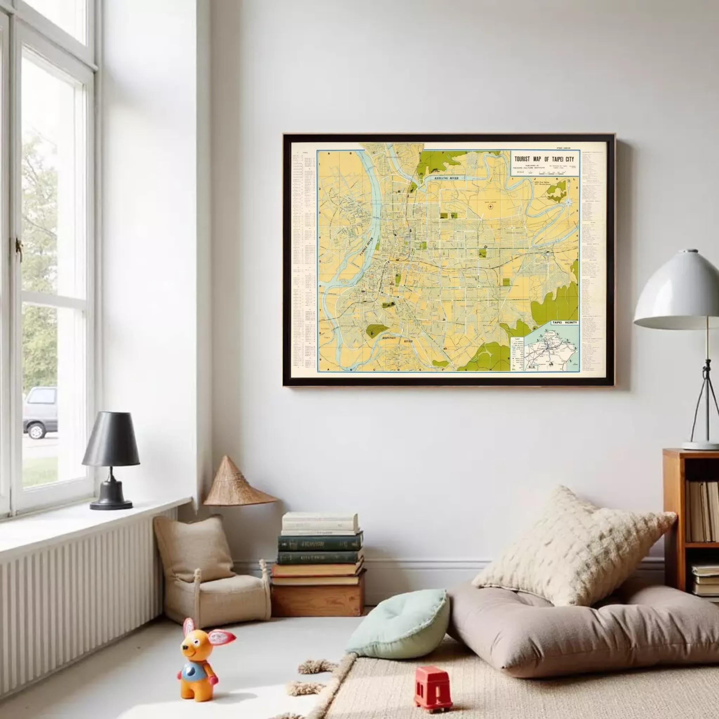 a cozy living room with a large framed map of a city hanging on the wall. The room has a comfortable seating area with a plush couch and a bean bag chair, as well as a bookshelf filled with books. A small child's toy is also present in the room.