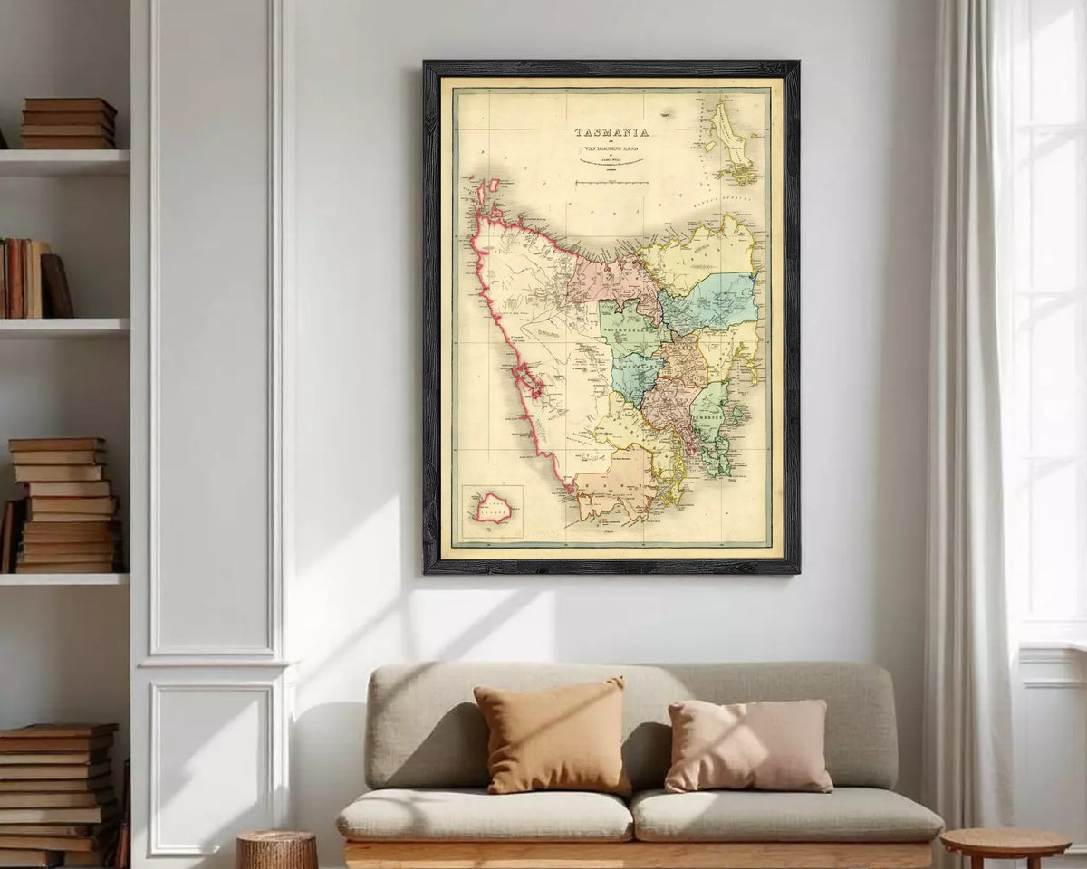 The image is a framed vintage map of Tasmania, Australia, depicting the state's geographical layout and boundaries.