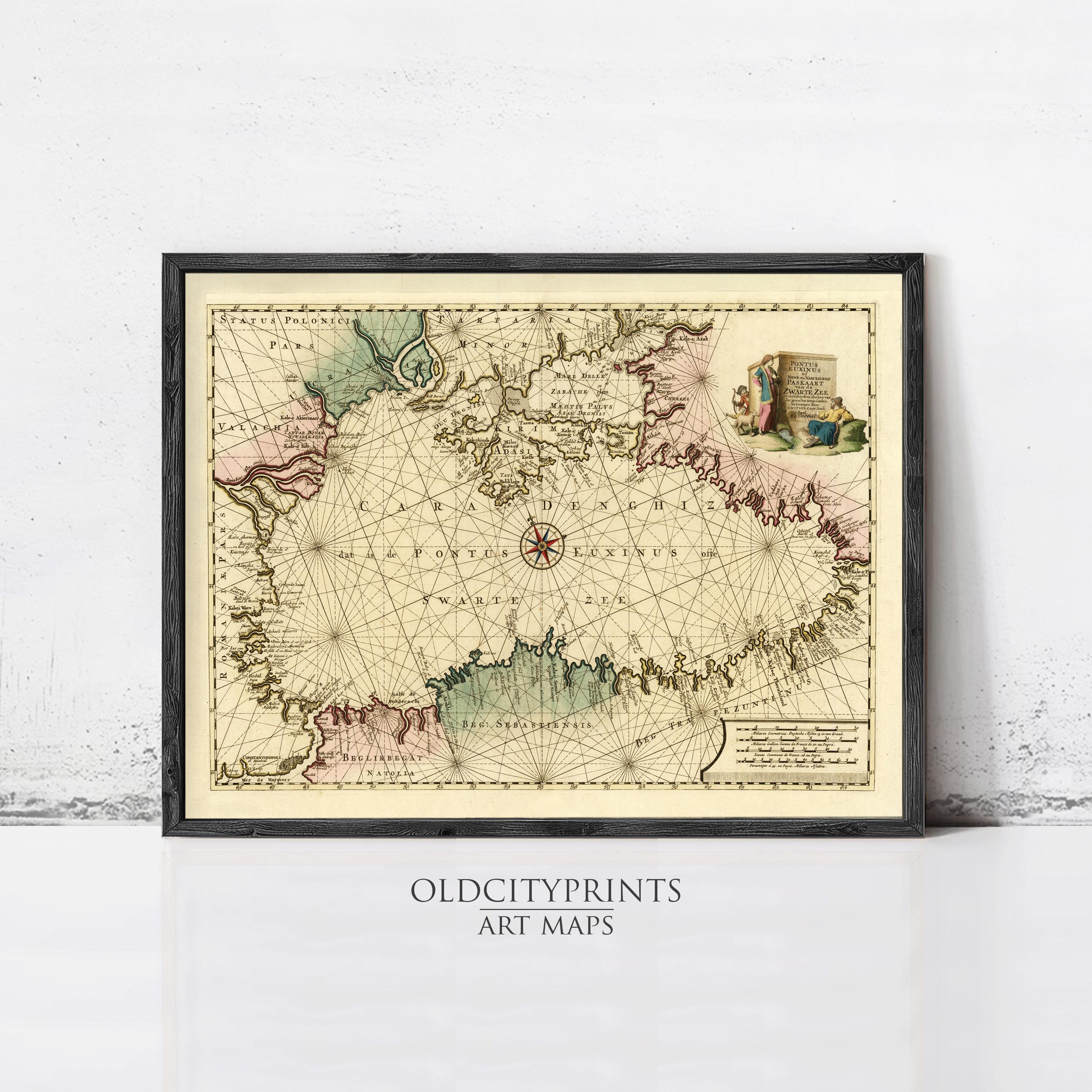 The image is a framed vintage map of the world, featuring intricate cartography and detailed geographical information.