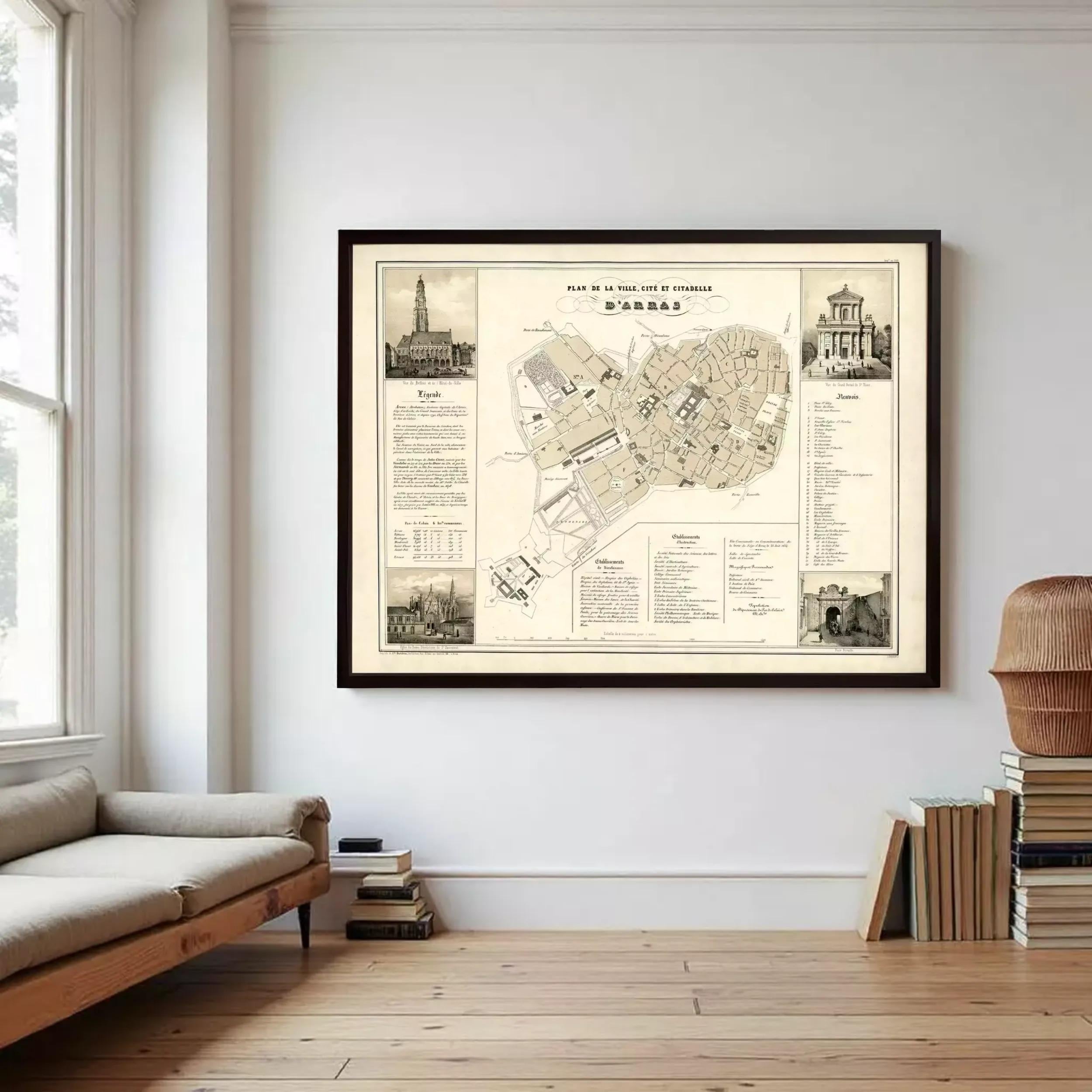 a large framed map of a city hanging on a wall in a room with a wooden floor and a bookshelf.