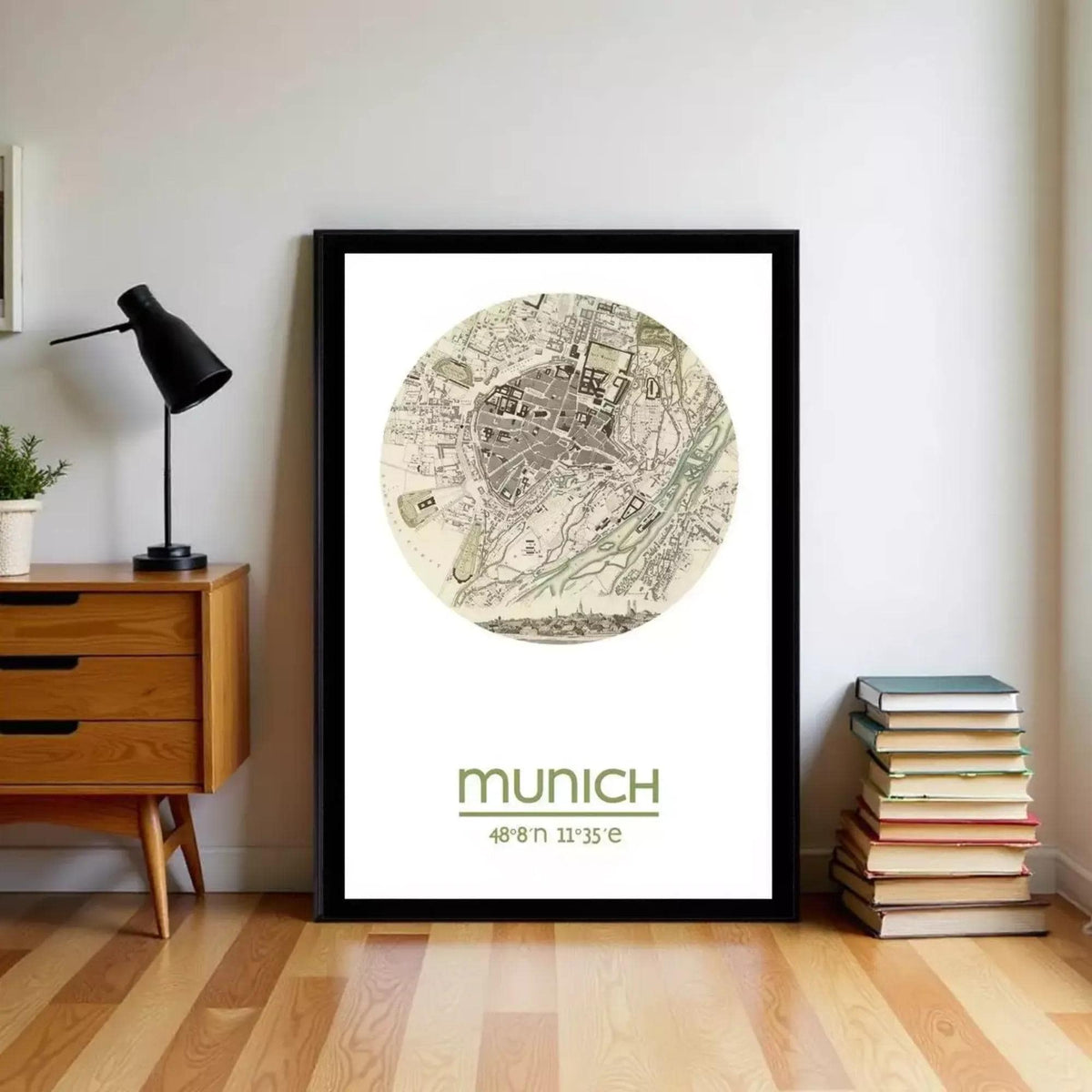 a framed map of Munich, Germany, with the text "München" written below it.