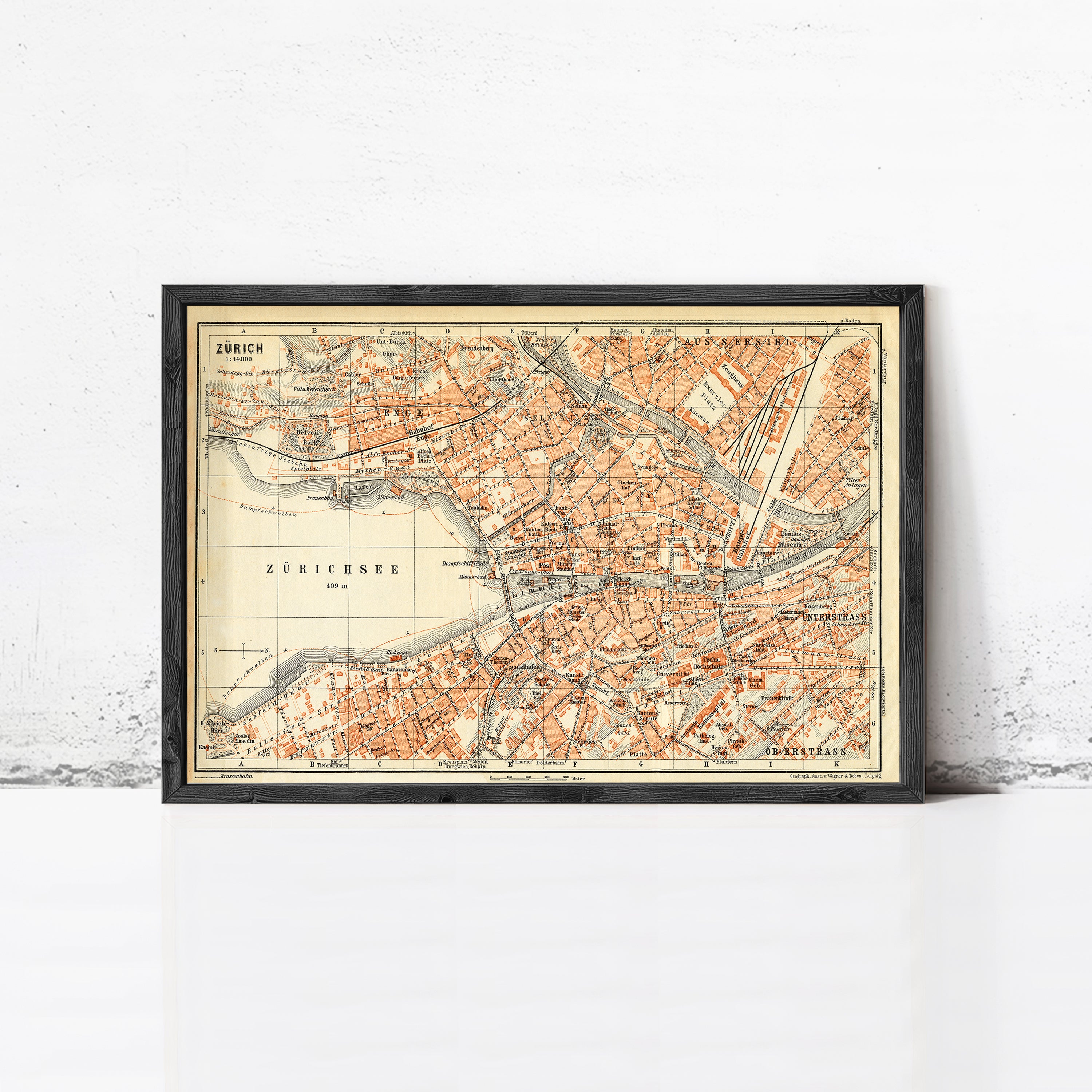The image is a framed vintage map of the city of Zürich, Switzerland, depicting the city's streets, landmarks, and surrounding areas.