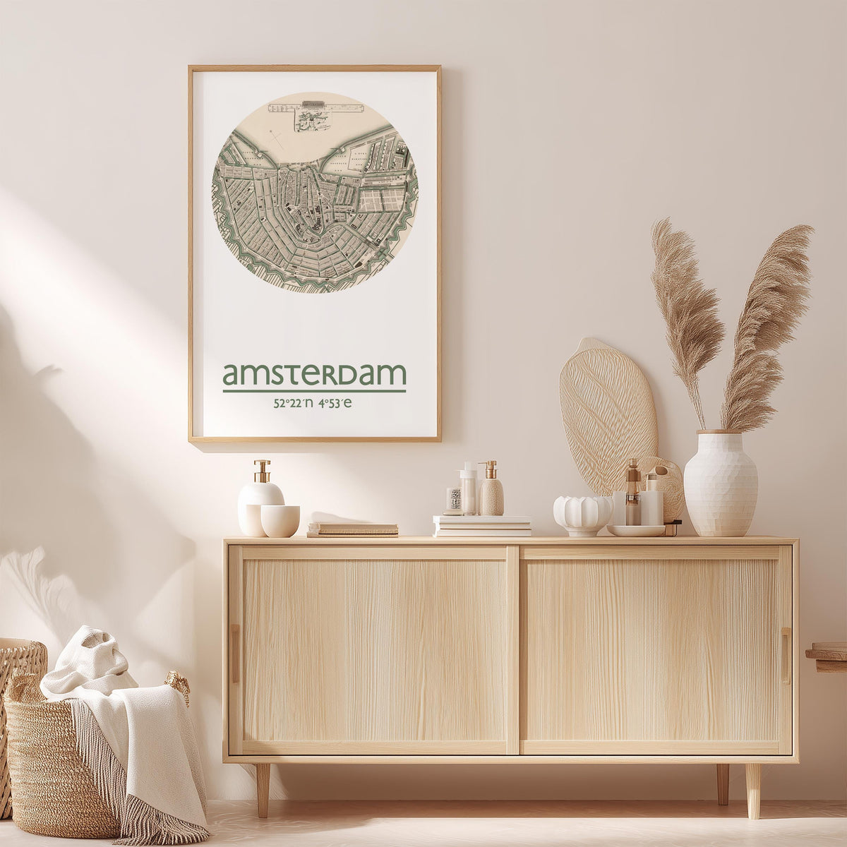 a wooden cabinet with a framed map of Amsterdam hanging on the wall above it. The cabinet has various items on top, including a potted plant, a vase, and some books. The overall setting appears to be a cozy and well-organized interior space.