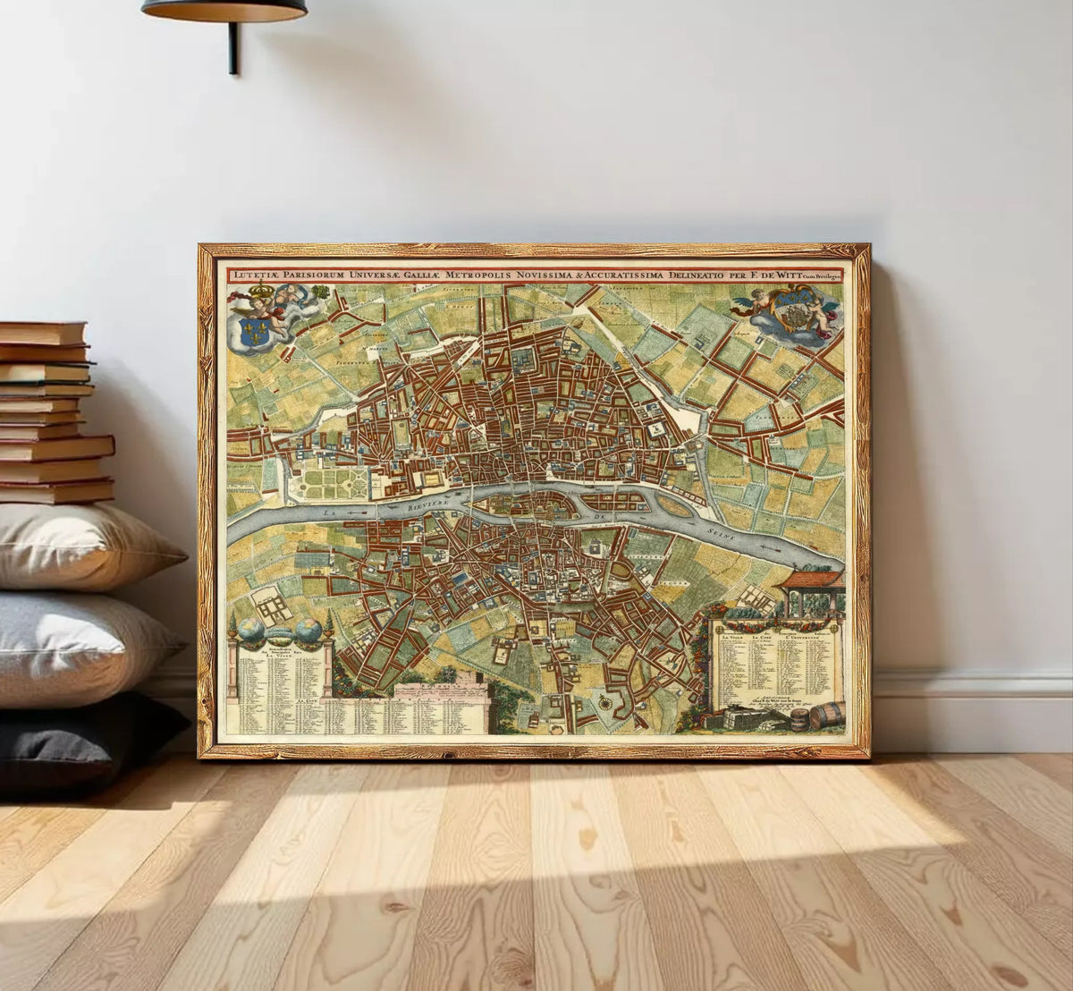 The image is a framed vintage map of a city, likely Paris, with detailed illustrations and labels.