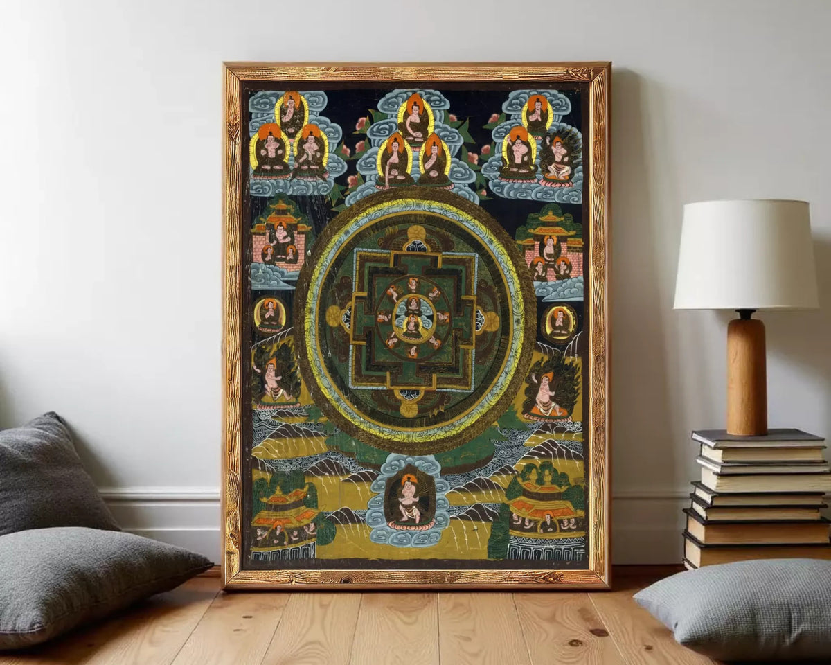 The image is a framed painting depicting a mandala with various Buddhist symbols and figures.