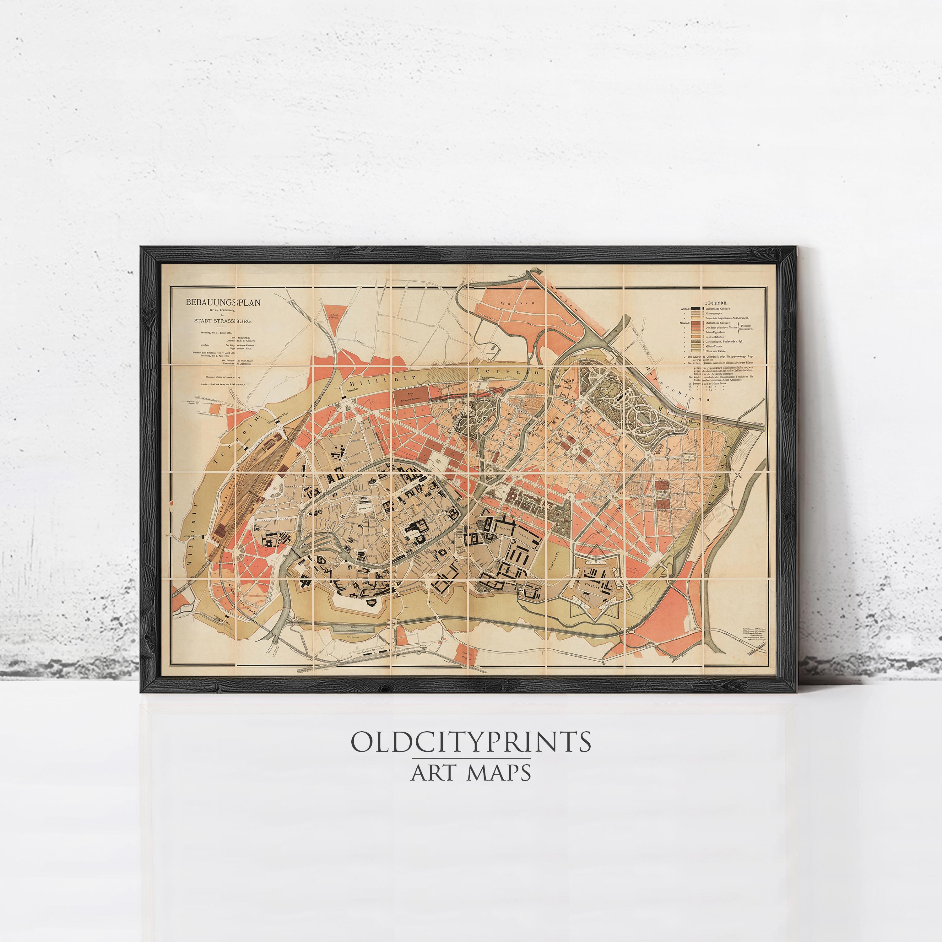 The image is a framed vintage map of a city, likely from the 19th century, with a black border and a beige color scheme.