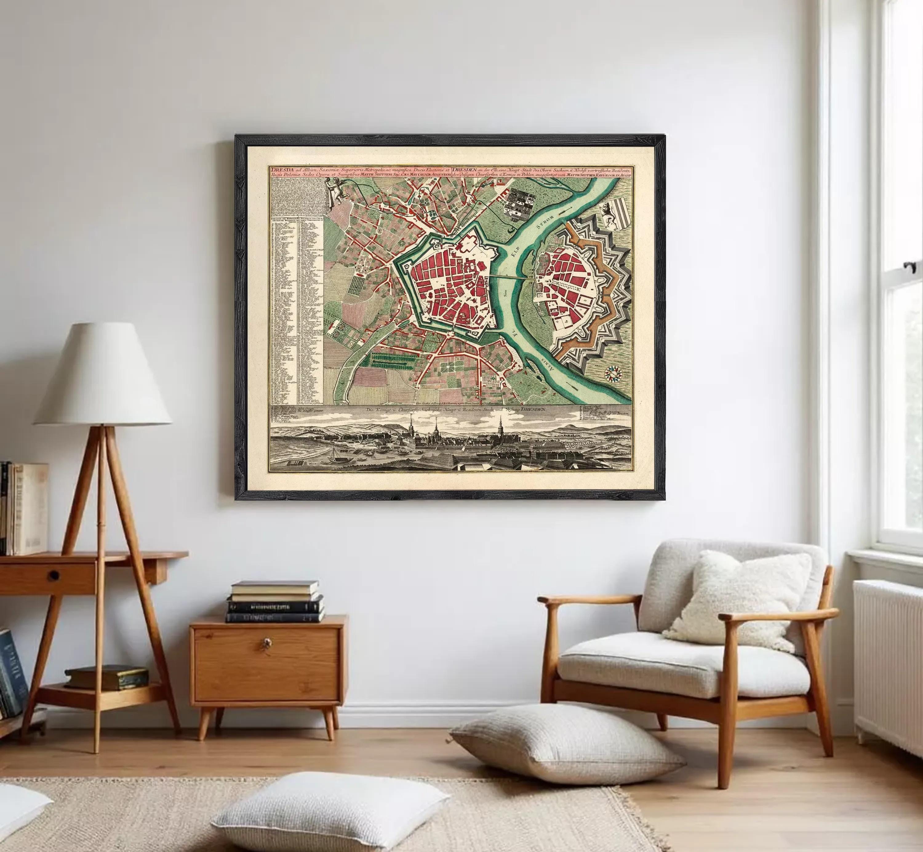 The image is a framed vintage map of a city, depicting a detailed layout of streets, buildings, and other urban features.