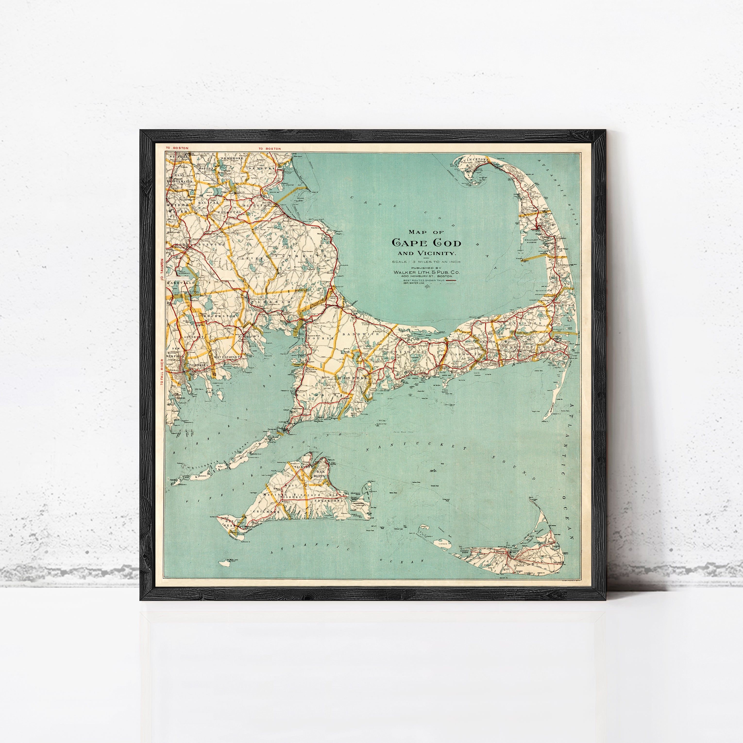 The image is a framed vintage map of Cape Cod, Massachusetts, showing the coastline, islands, and roads in a detailed and colorful manner.