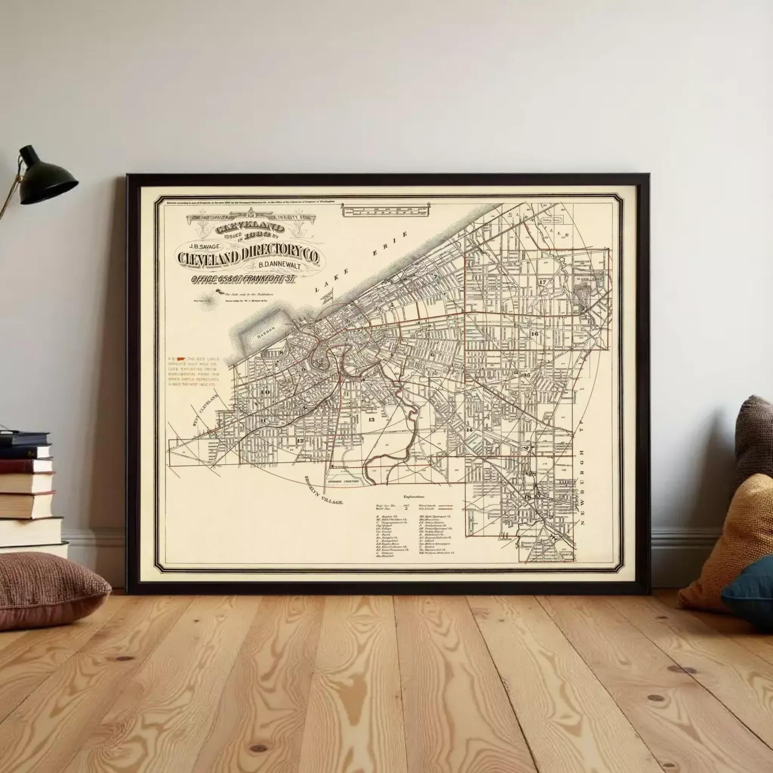 The image is a framed map of Cleveland, Ohio, depicting the city's streets and neighborhoods.