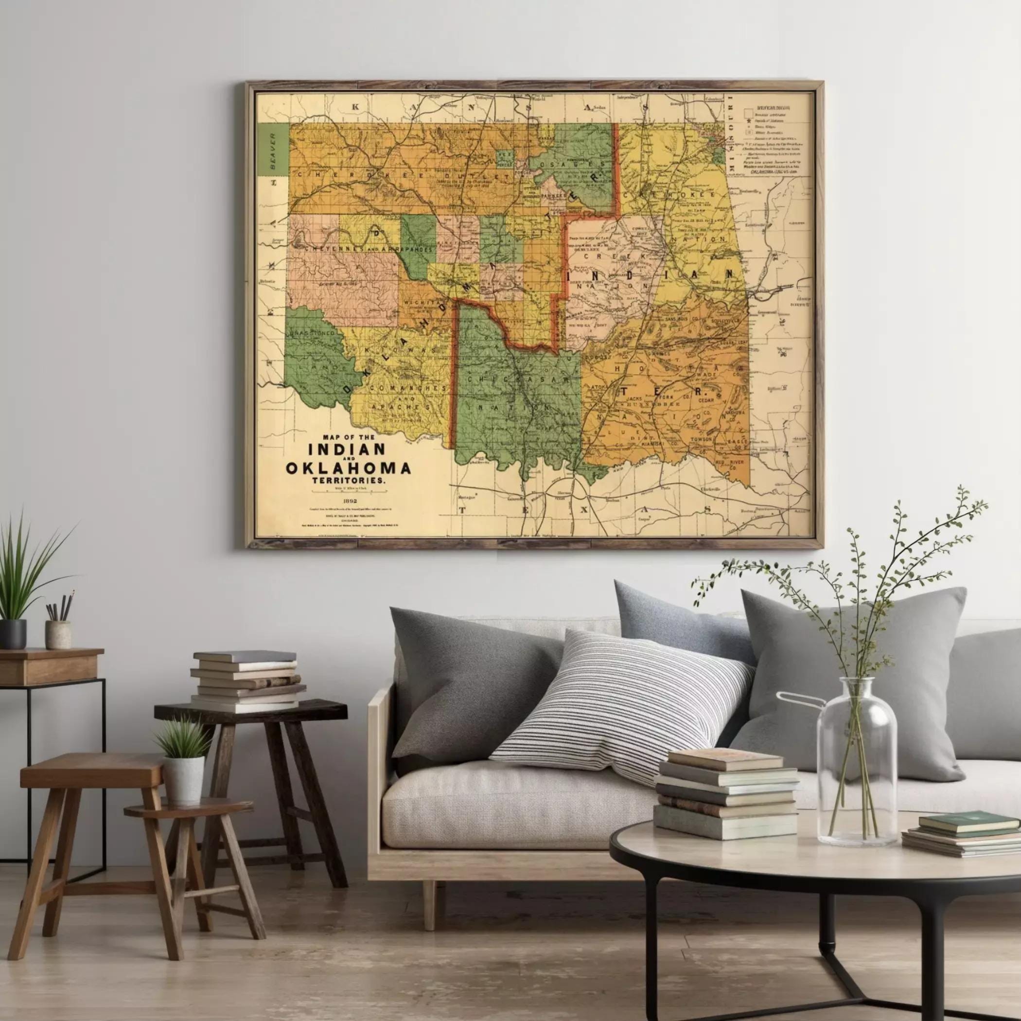 a large framed map of the state of Oklahoma hanging on a wall in a living room setting.