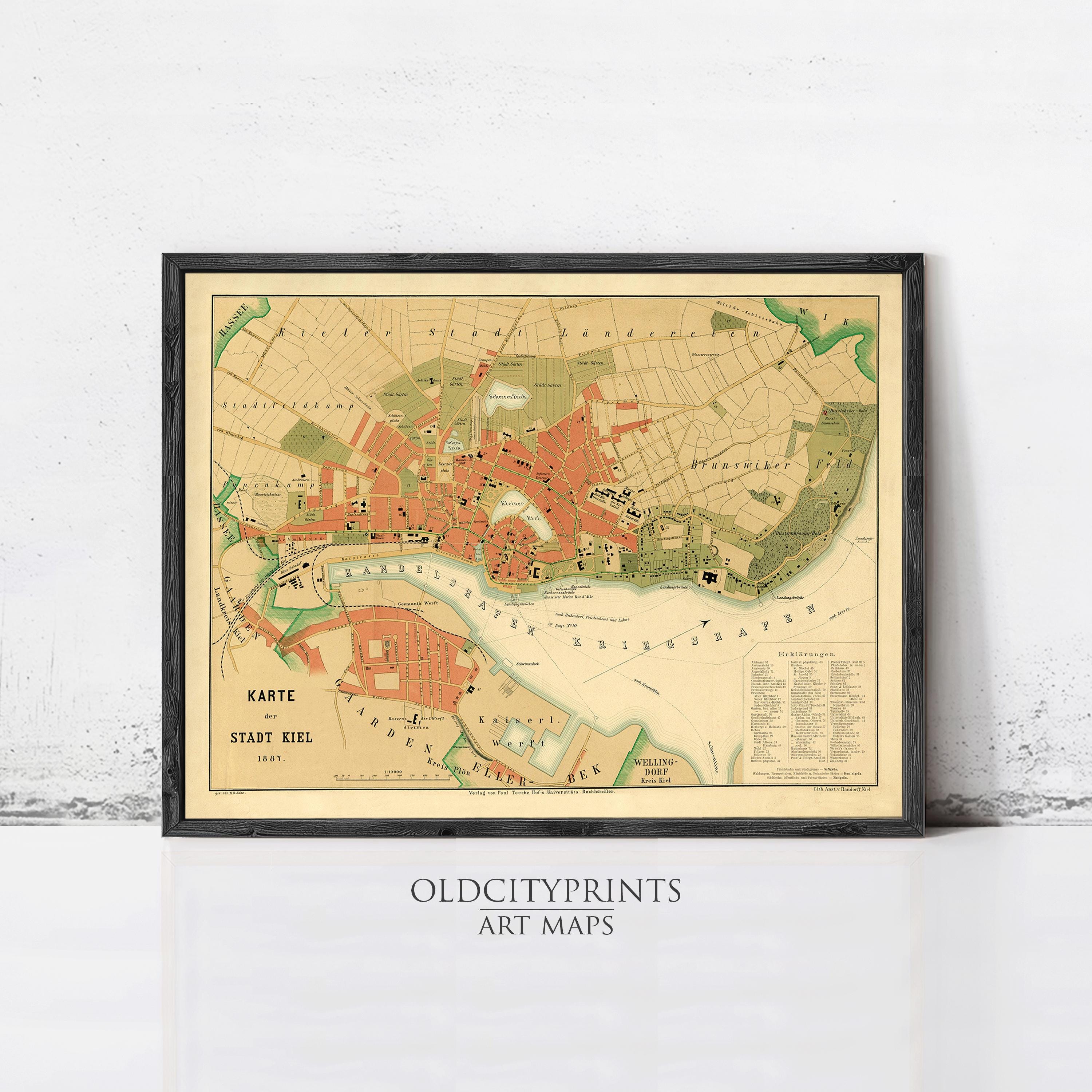 The image is a framed art map of a city, depicting various landmarks and streets.