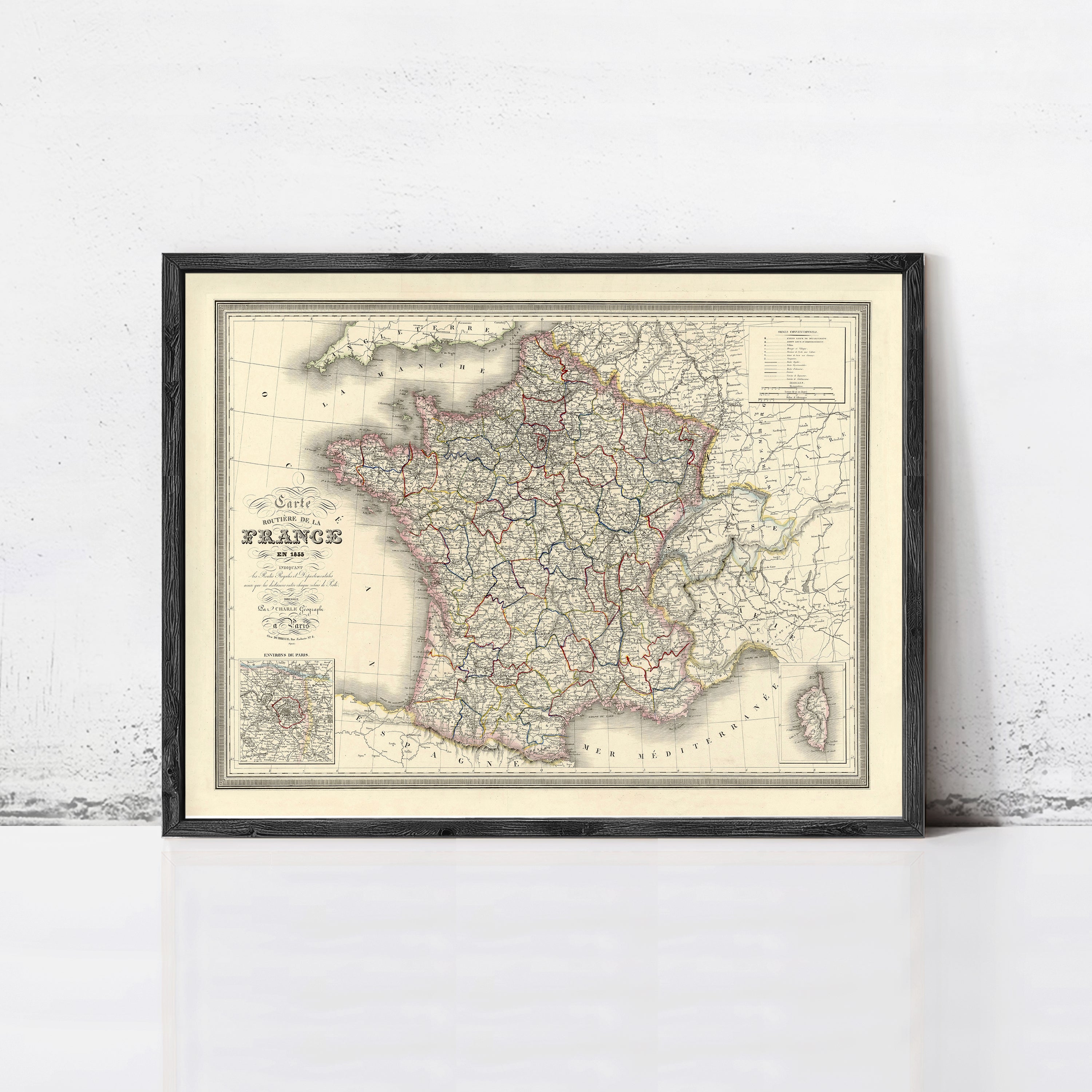 The image is a framed vintage map of France, depicting the country's geographical layout and major cities.