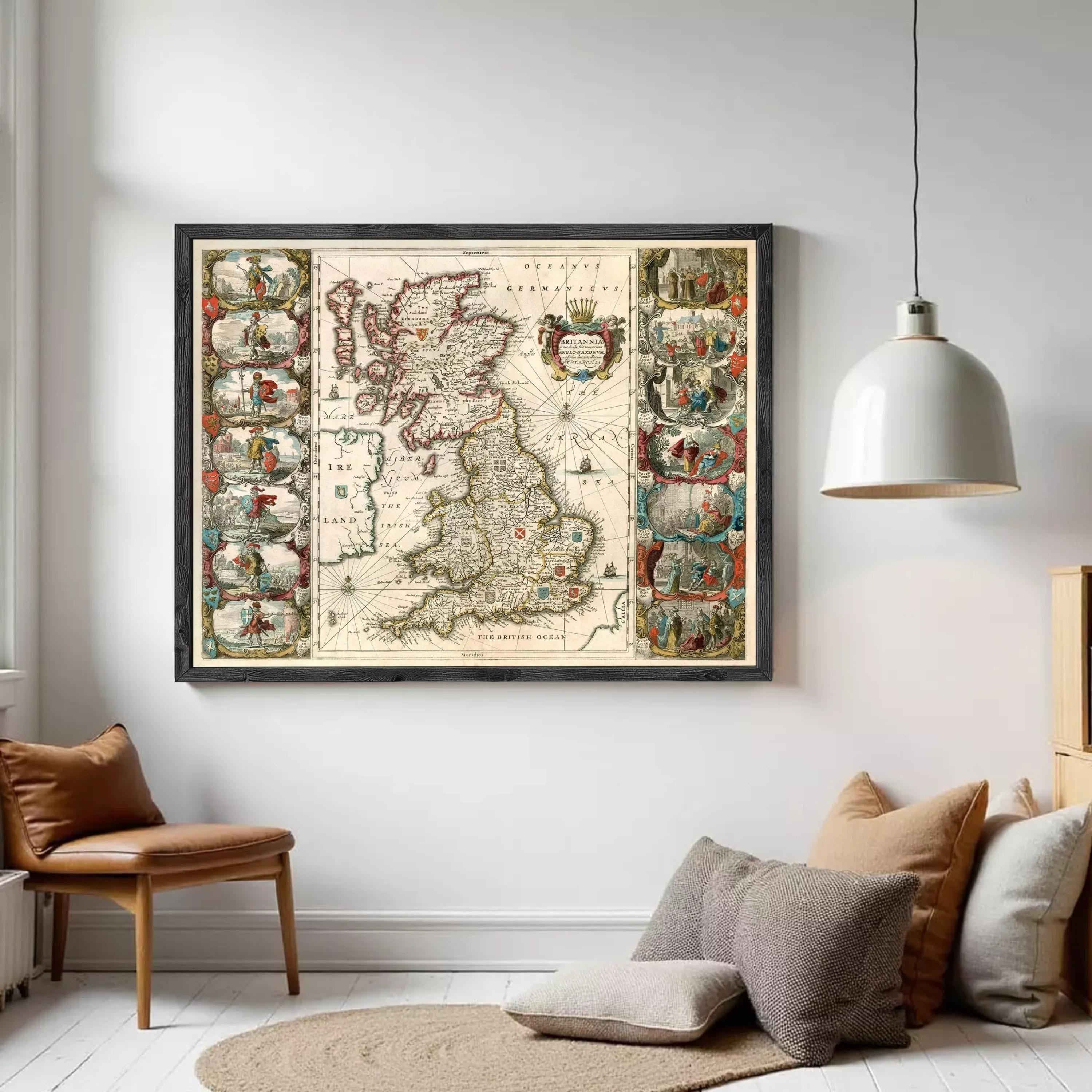 The image is a framed vintage map of the United Kingdom, featuring intricate illustrations and detailed cartography.
