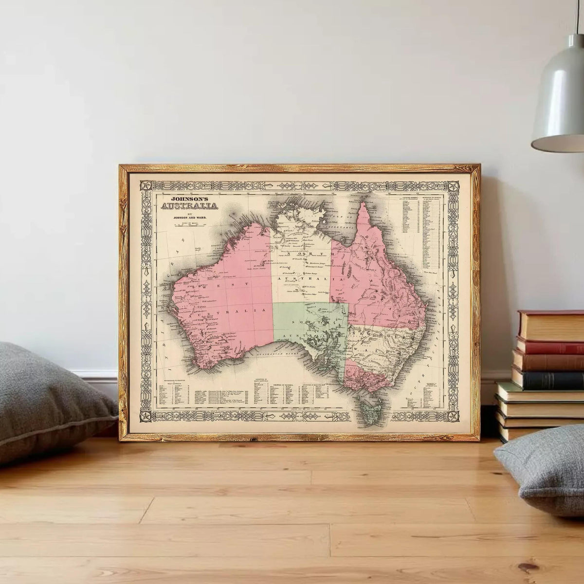 The image is a framed vintage map of Australia, depicting the country in a detailed and intricate manner.