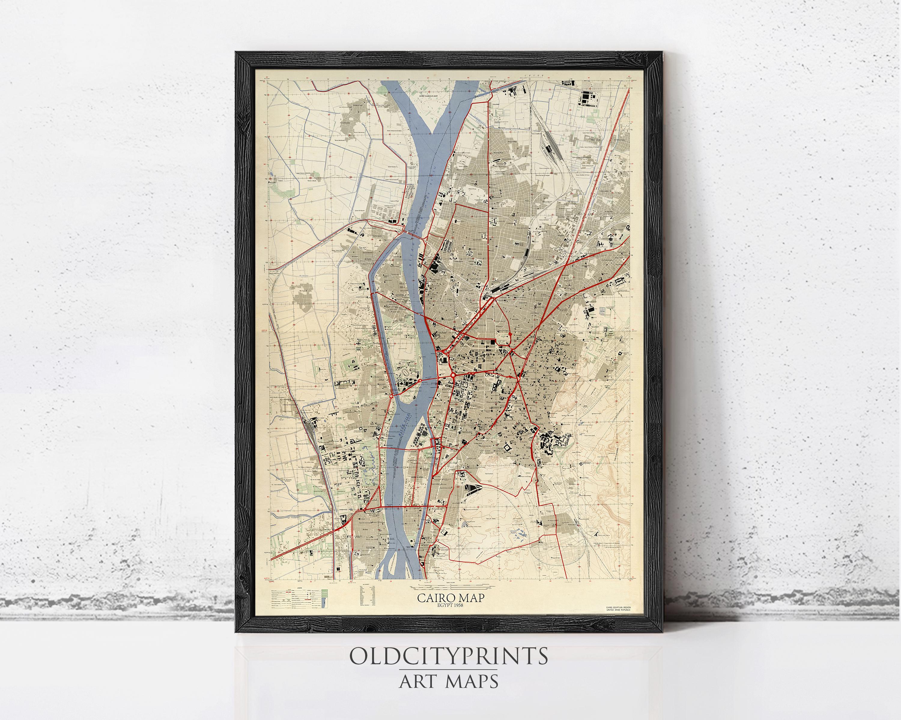 The image is a framed map of Cairo, Egypt, depicting the city's streets, landmarks, and waterways.